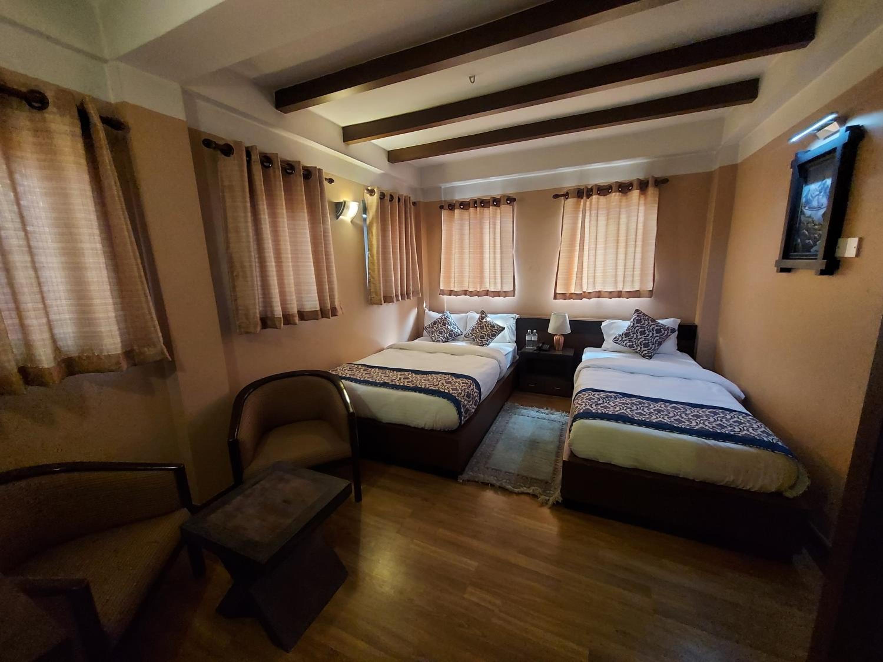 Deluxe Triple Room