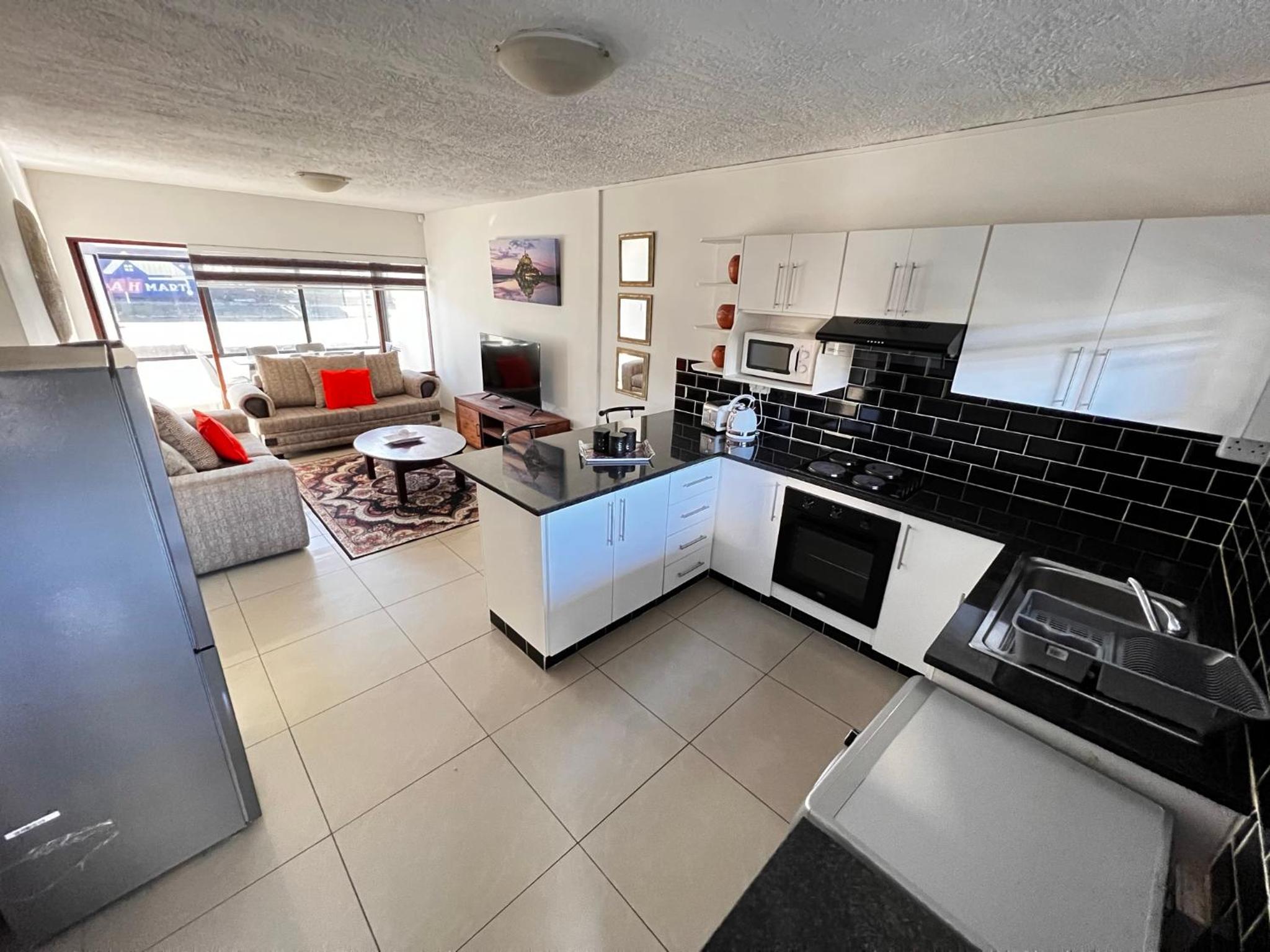 Three-Bedroom Apartment - Photo 9