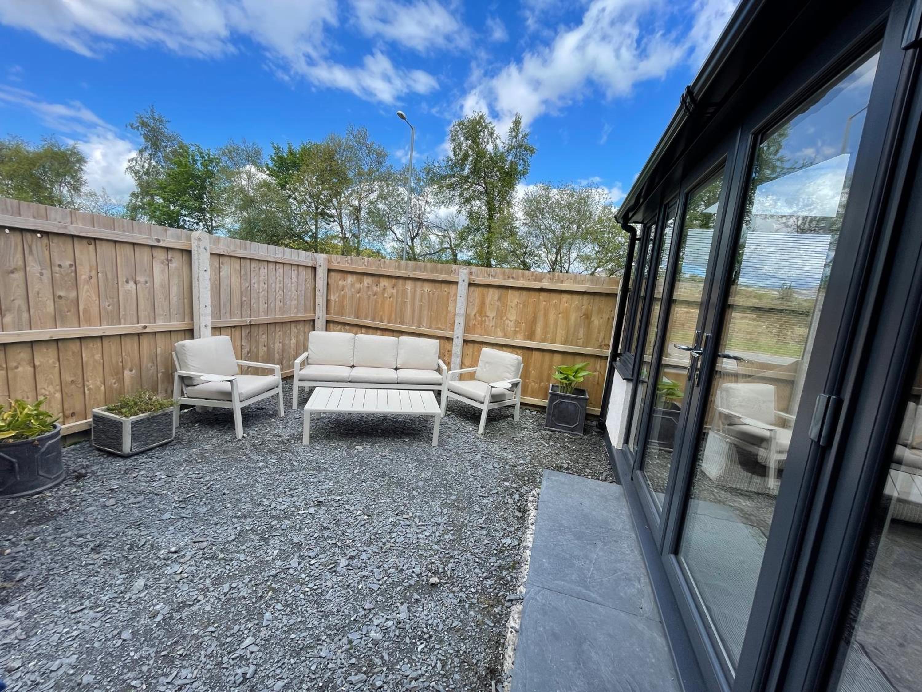 Three-Bedroom House - Photo 25