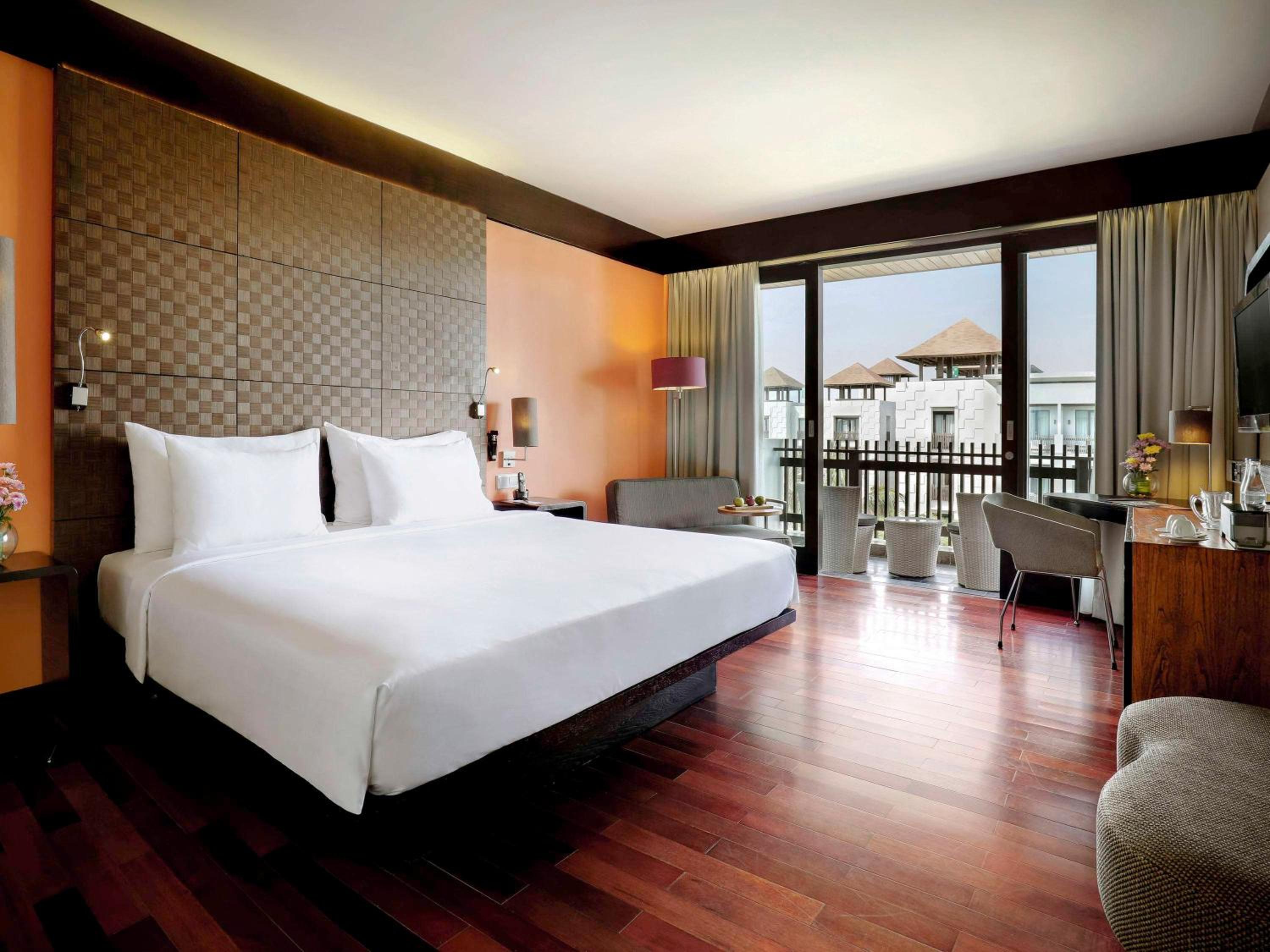 Deluxe Room, 1 King Size Bed, Garden View with Free Kids and Resort Activities - Photo 1