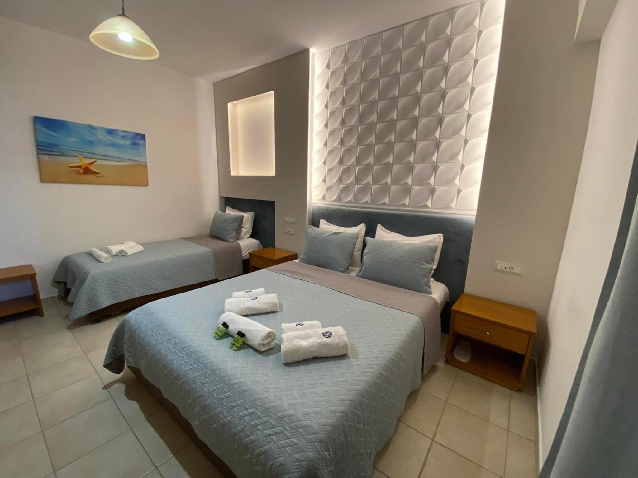 Deluxe Triple Room - Photo 10