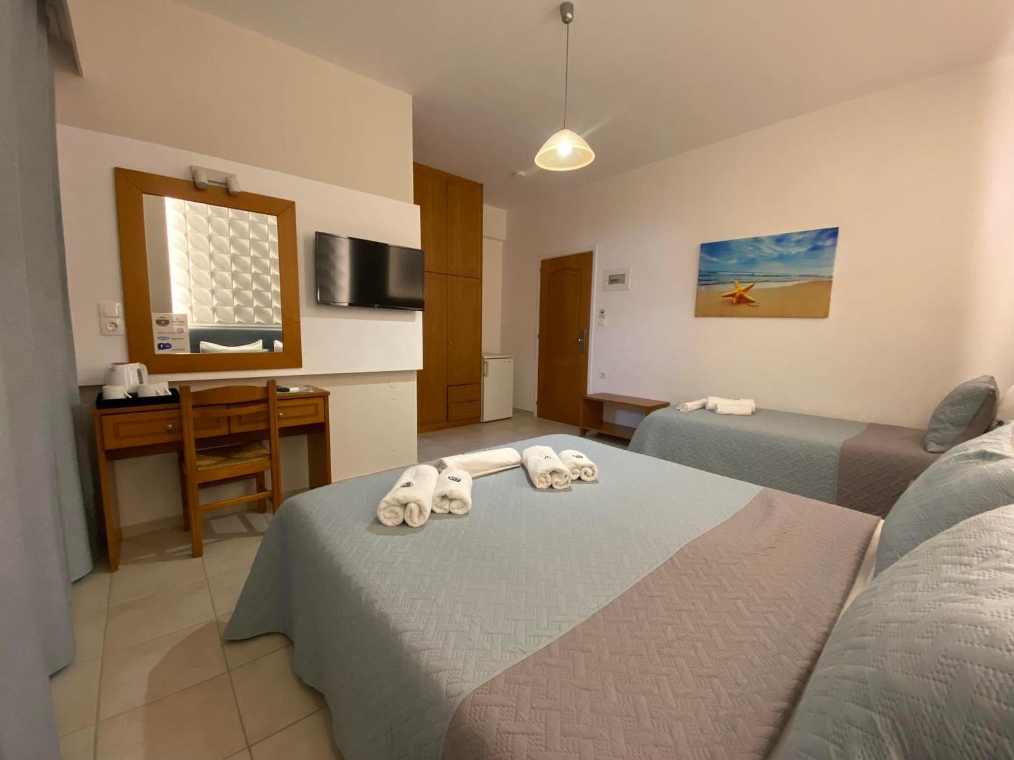 Deluxe Triple Room - Photo 11
