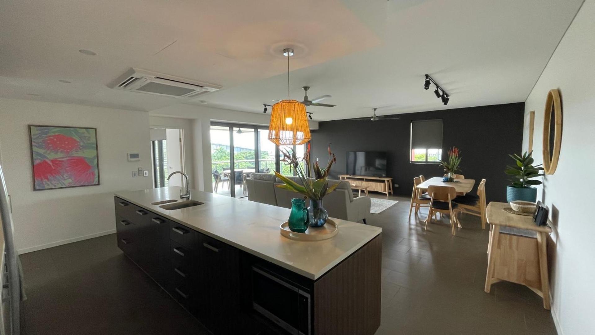 Three-Bedroom Apartment - Photo 2