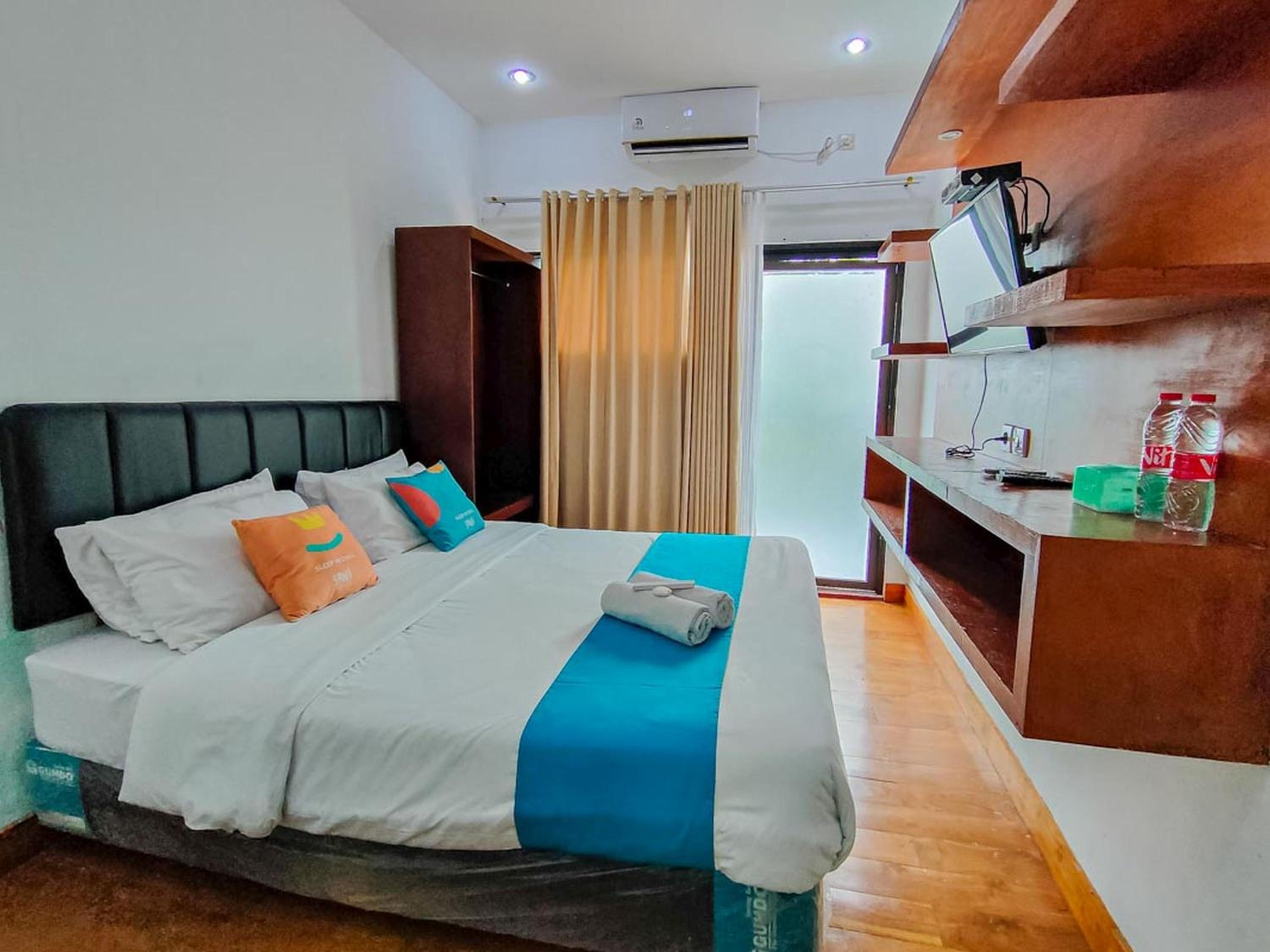 Deluxe Room - Photo 1
