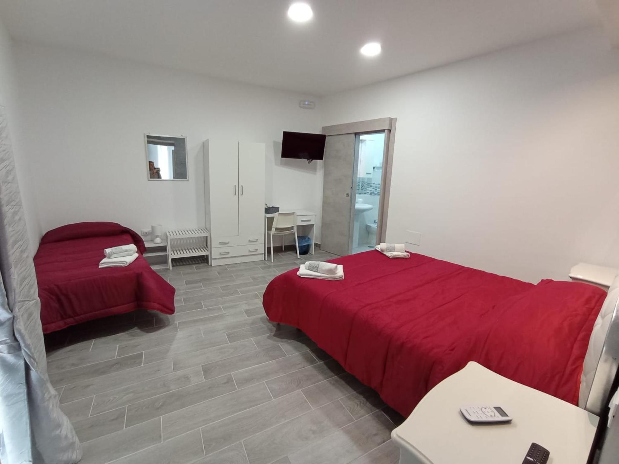Double Room with Balcony (2 Adults + 1 Child) photo 2