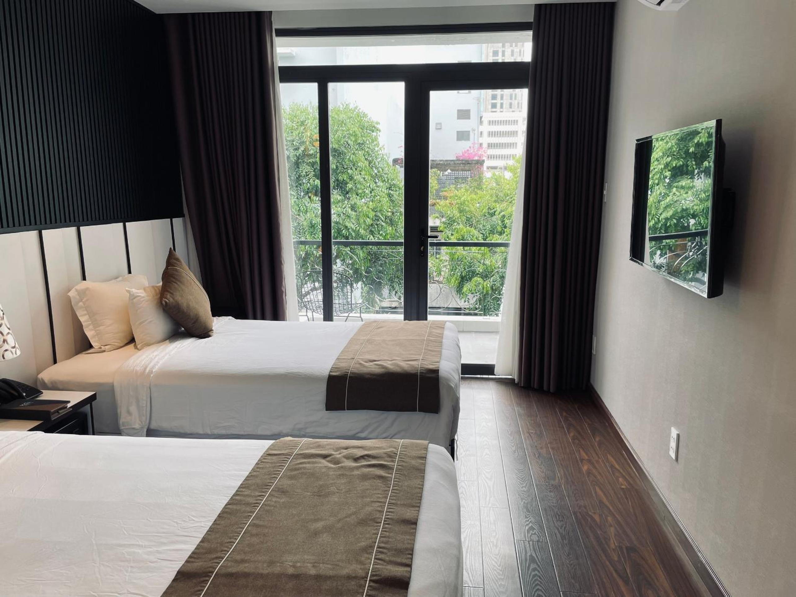 Deluxe Twin Room - Photo 2