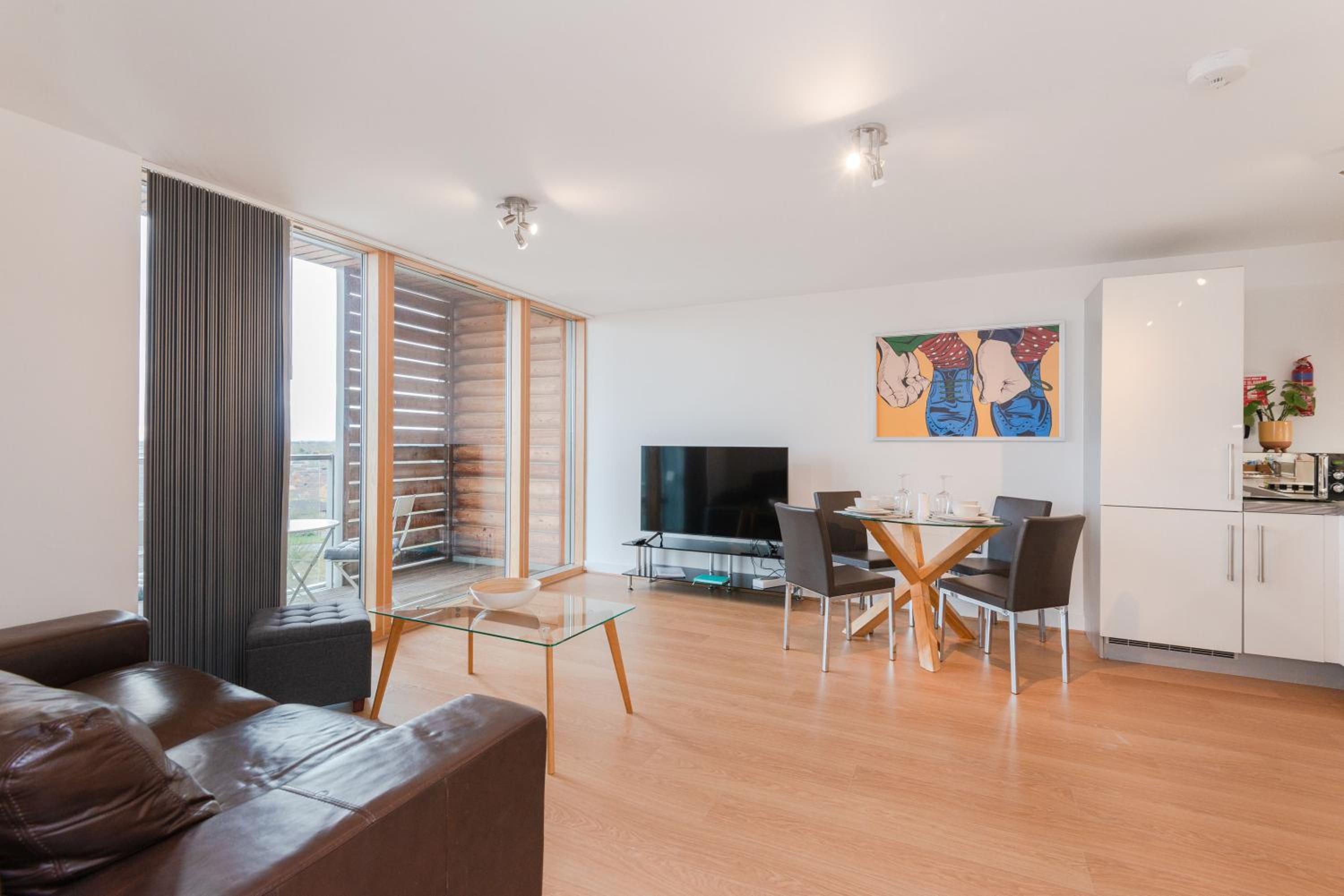 One-Bedroom Apartment with Balcony and City View