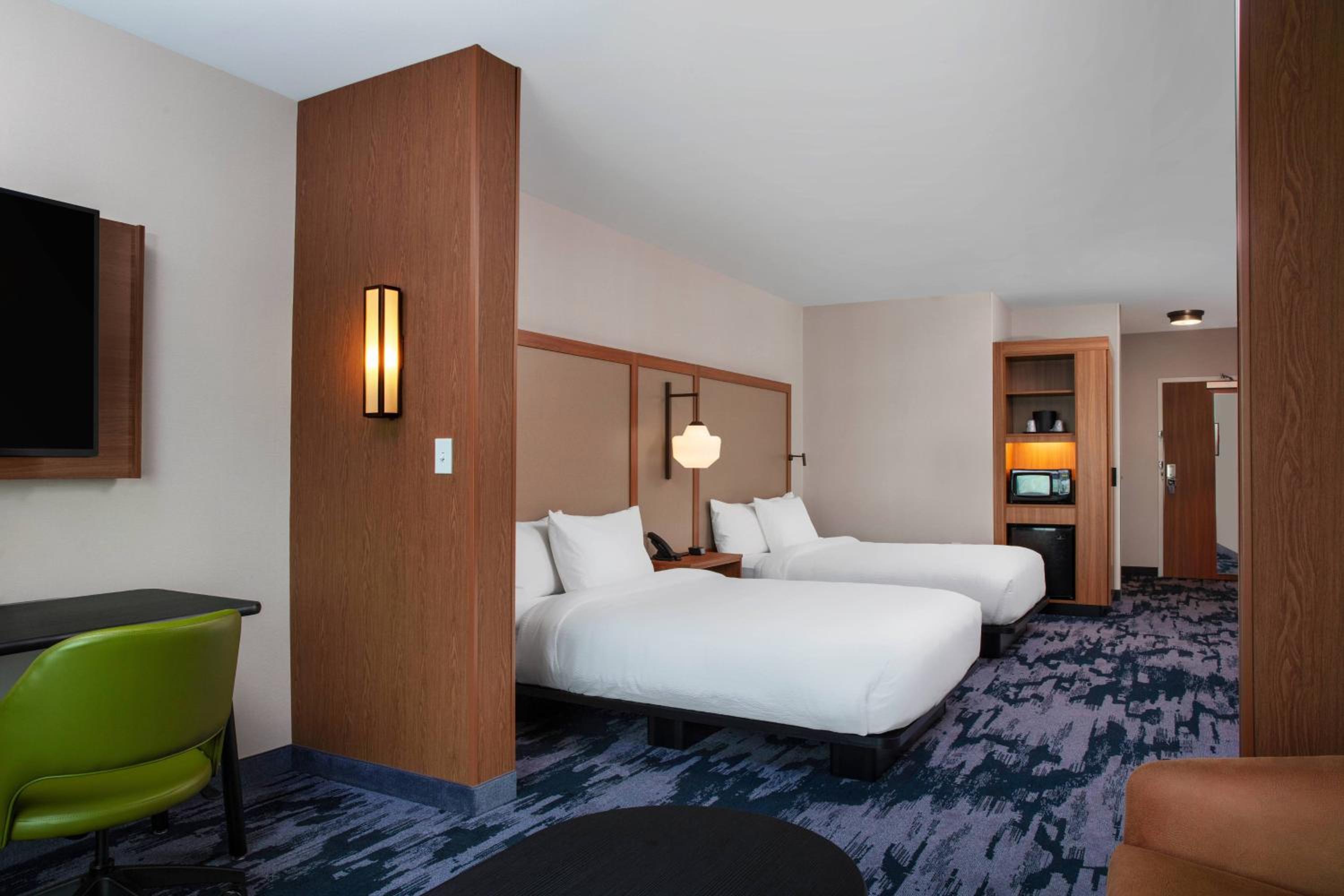 Queen Suite with Two Queen Beds and Sofa Bed - Photo 1