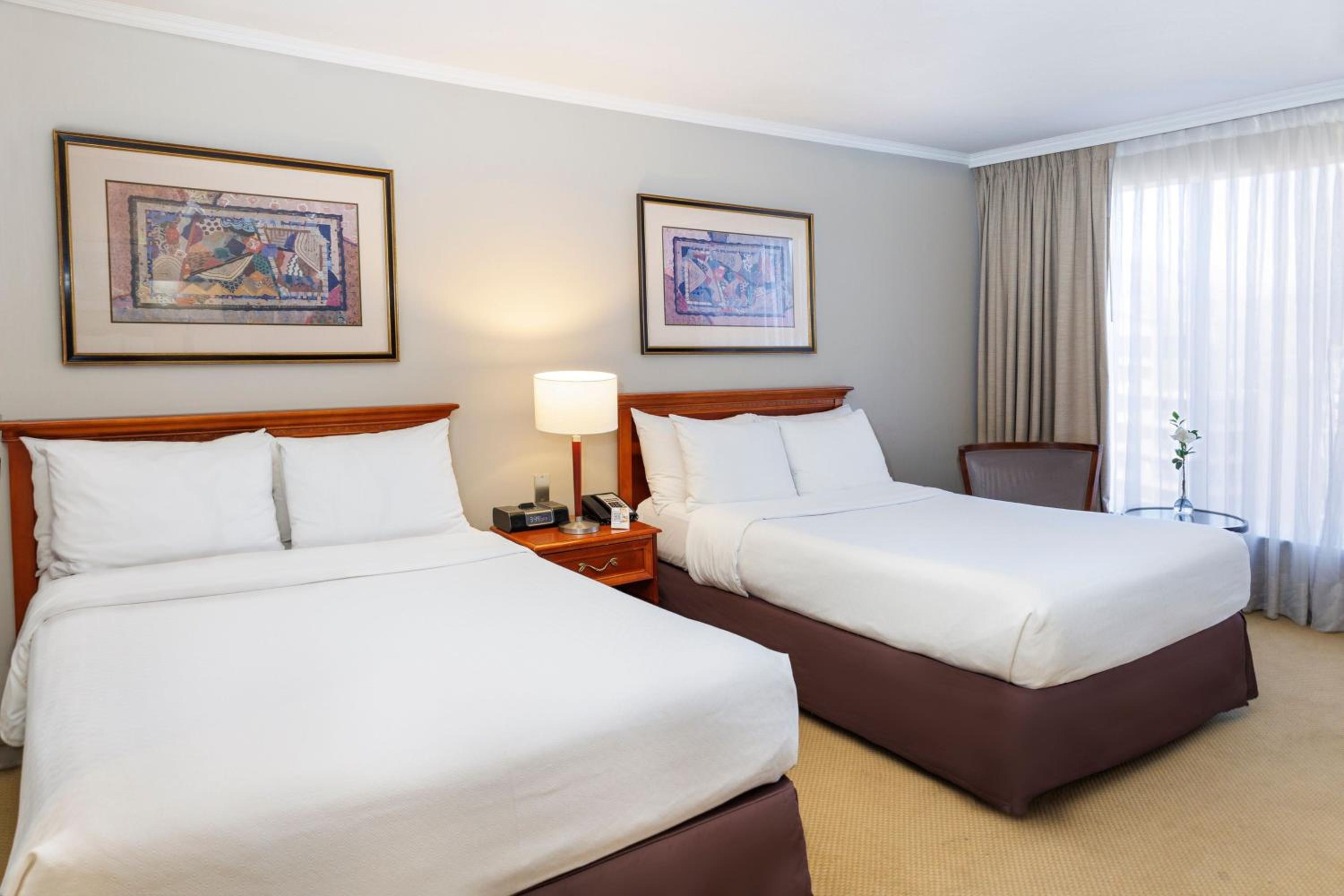 Classic Queen Room with Two Queen Beds and City view - Photo 1