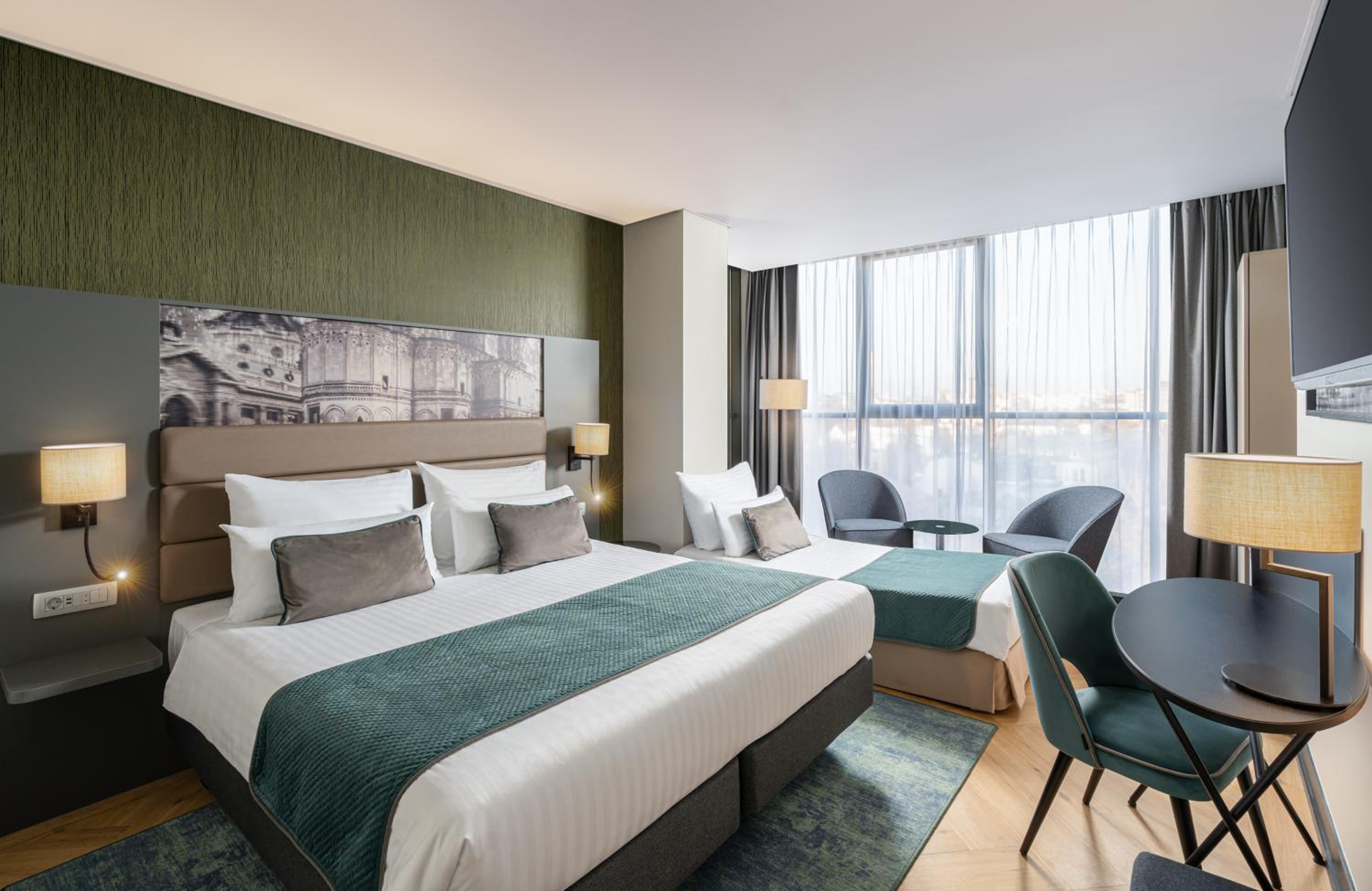 Deluxe Triple Room - Photo 1