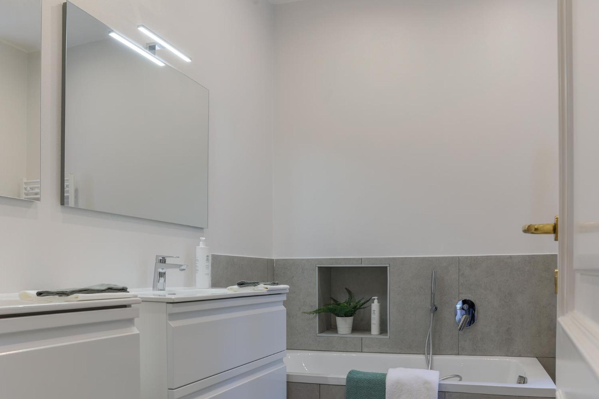Three-Bedroom Apartment - Photo 12