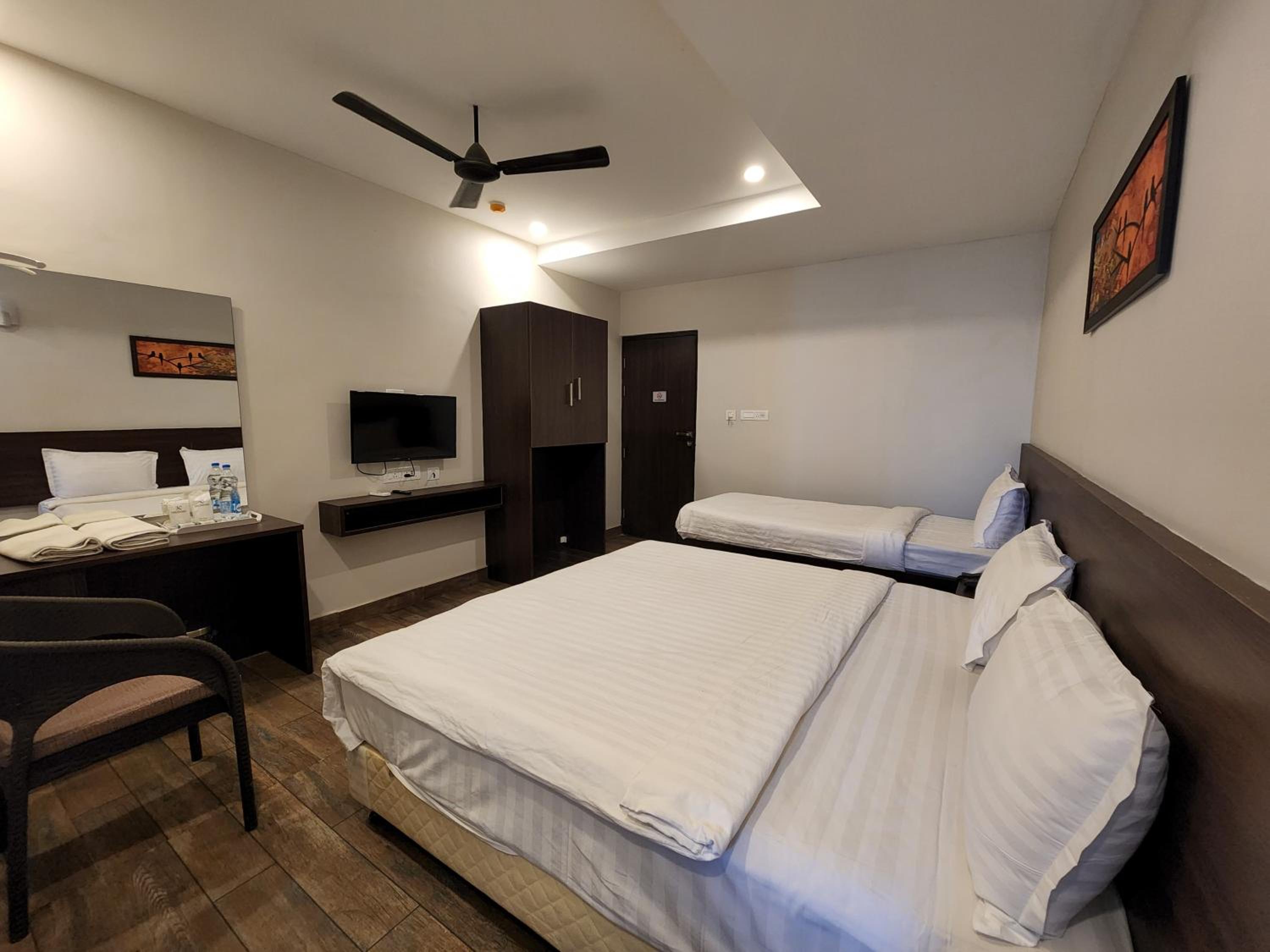 Deluxe Triple Room - Photo 1