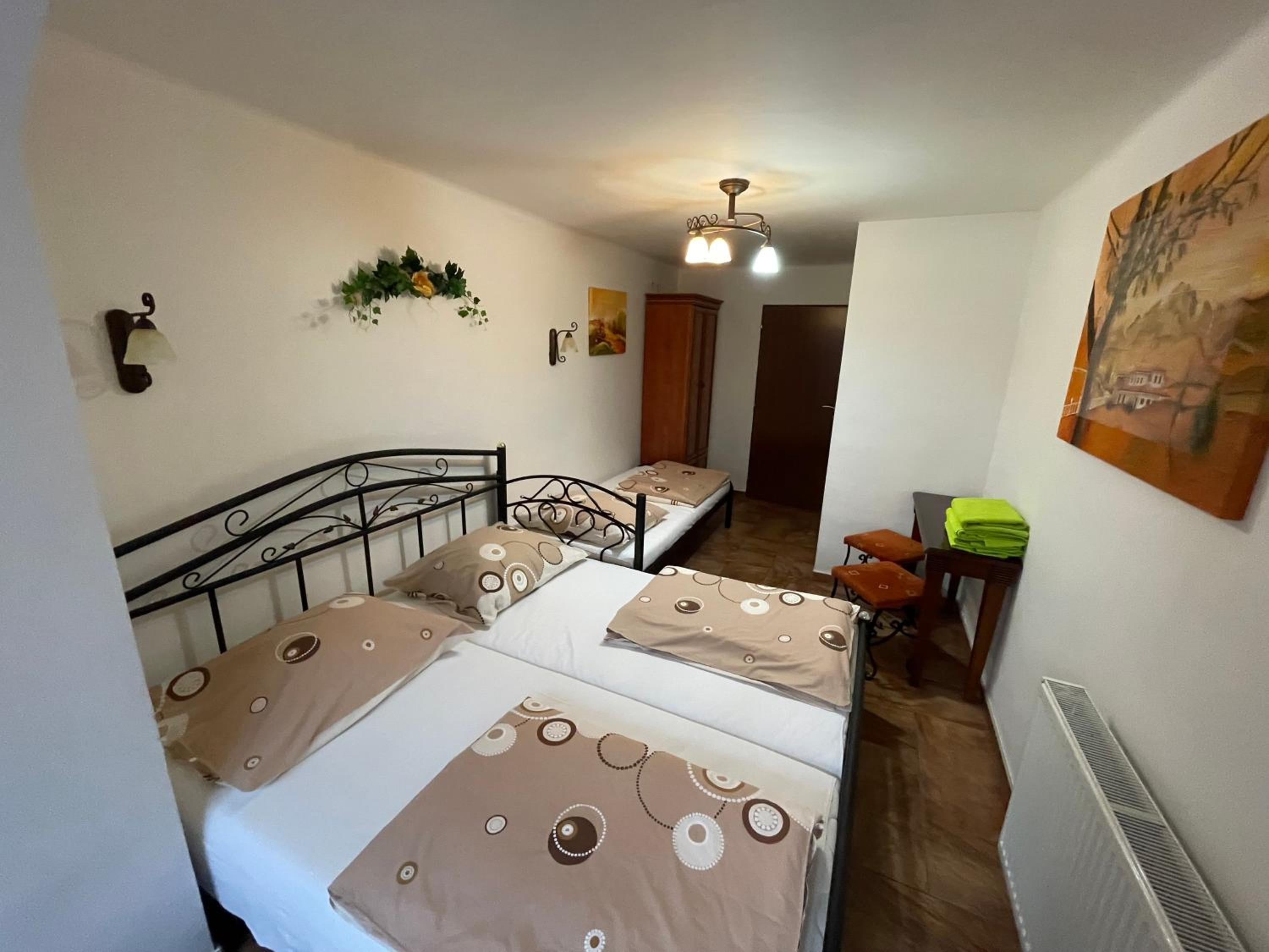 Quadruple Room with Private Bathroom - Photo 1