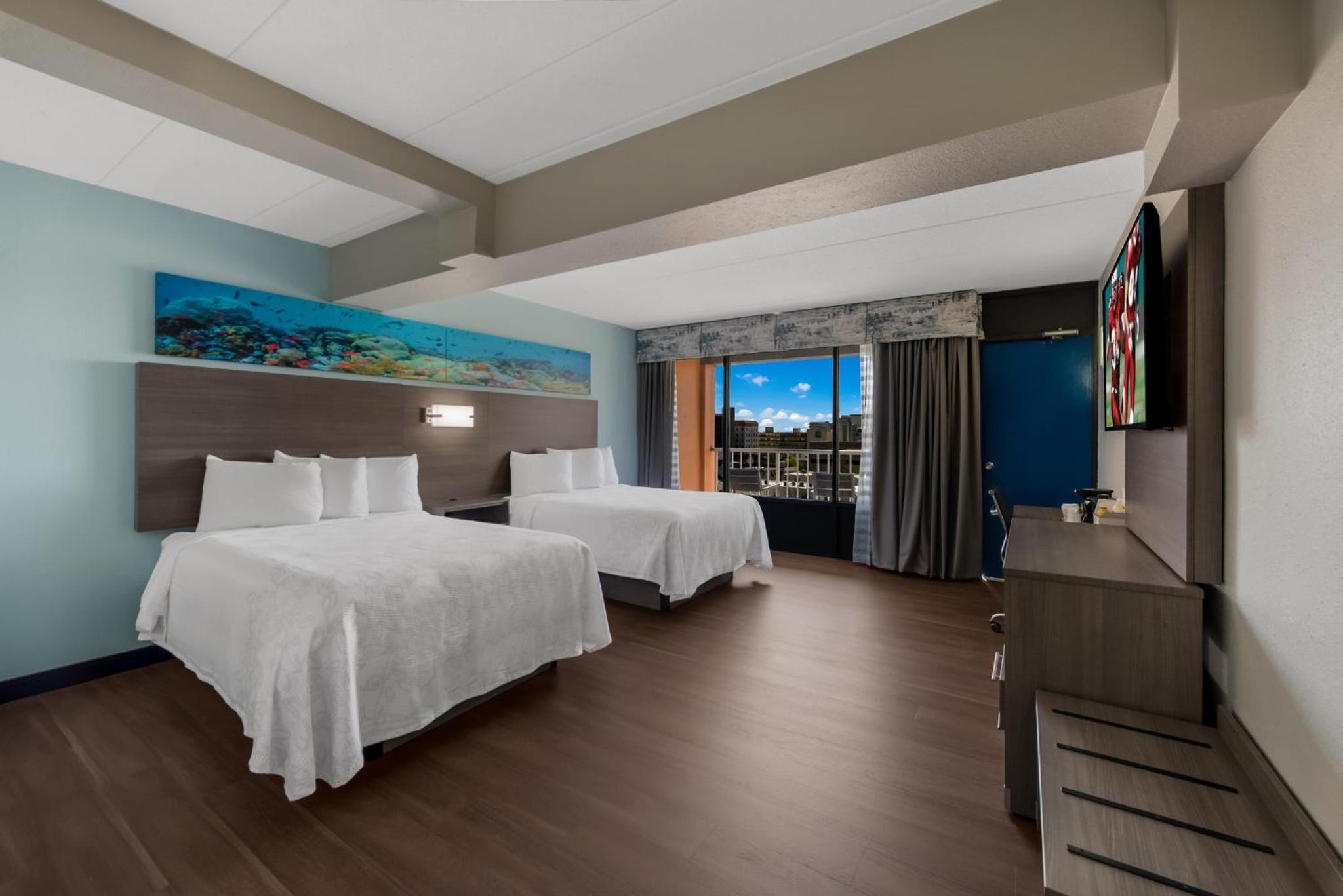 Premium Two Double Beds with Partial Ocean View Smoke Free (Upgraded Bedding) - Photo 1