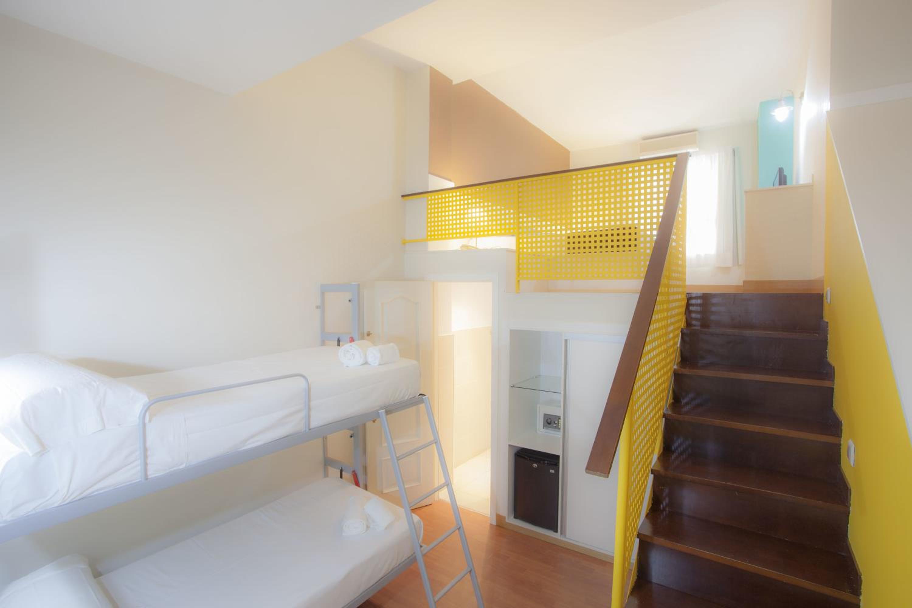 Habitación Cuádruple (2 Adultos + 2 Niños)