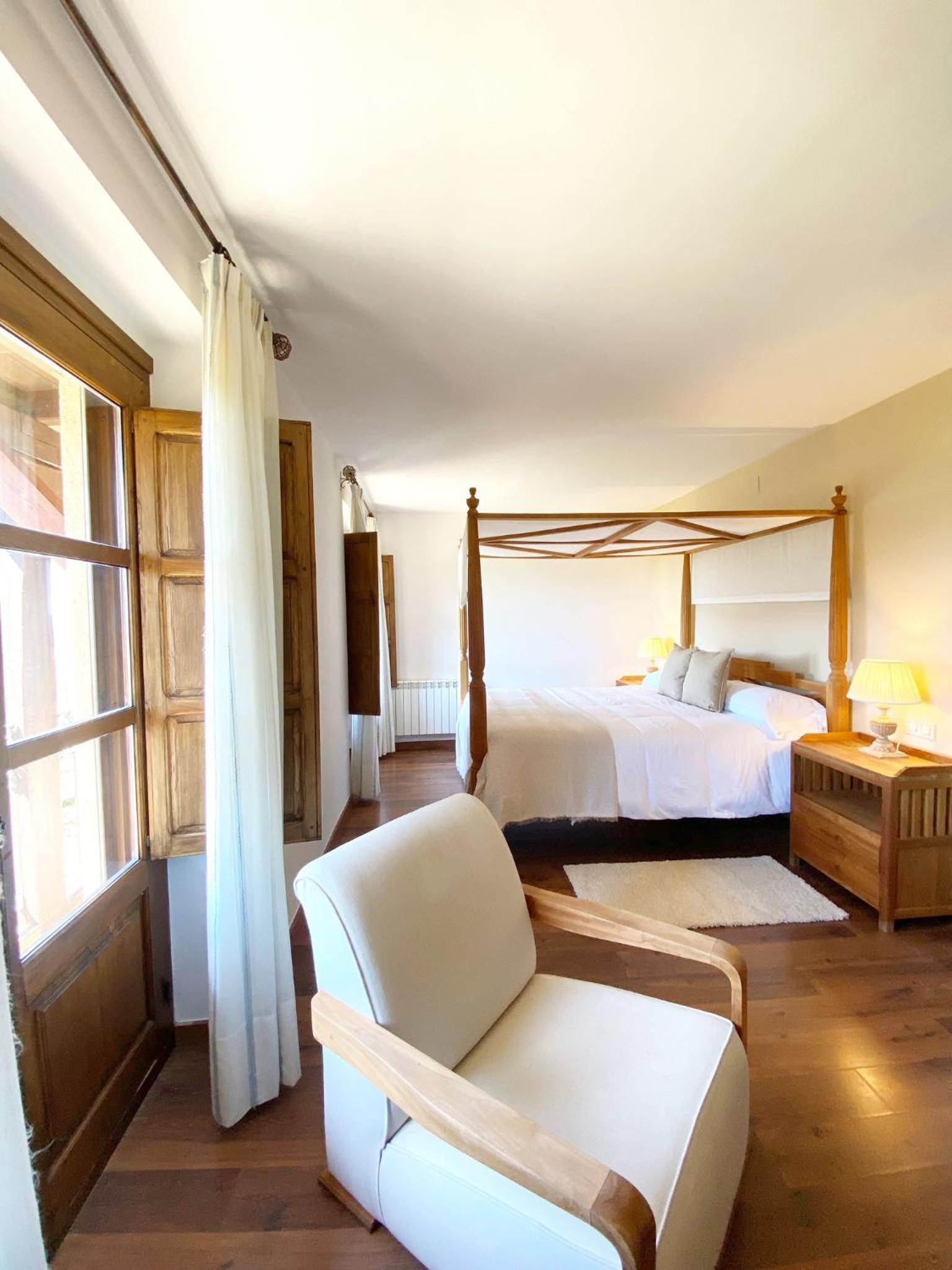 Habitación Cuádruple con Balcón y Vistas al Jardín