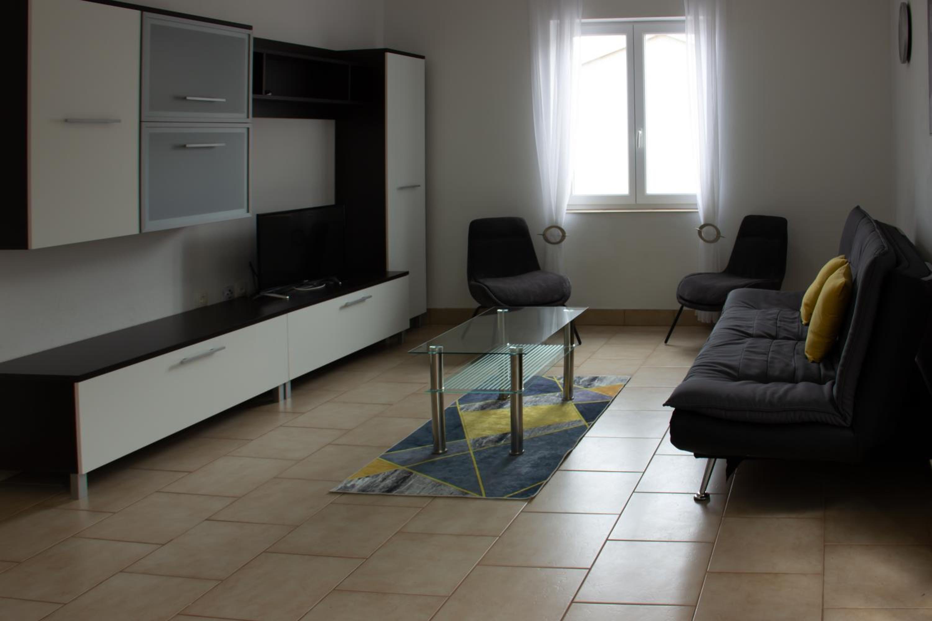 Two-Bedroom Apartment with Balcony and Sea View