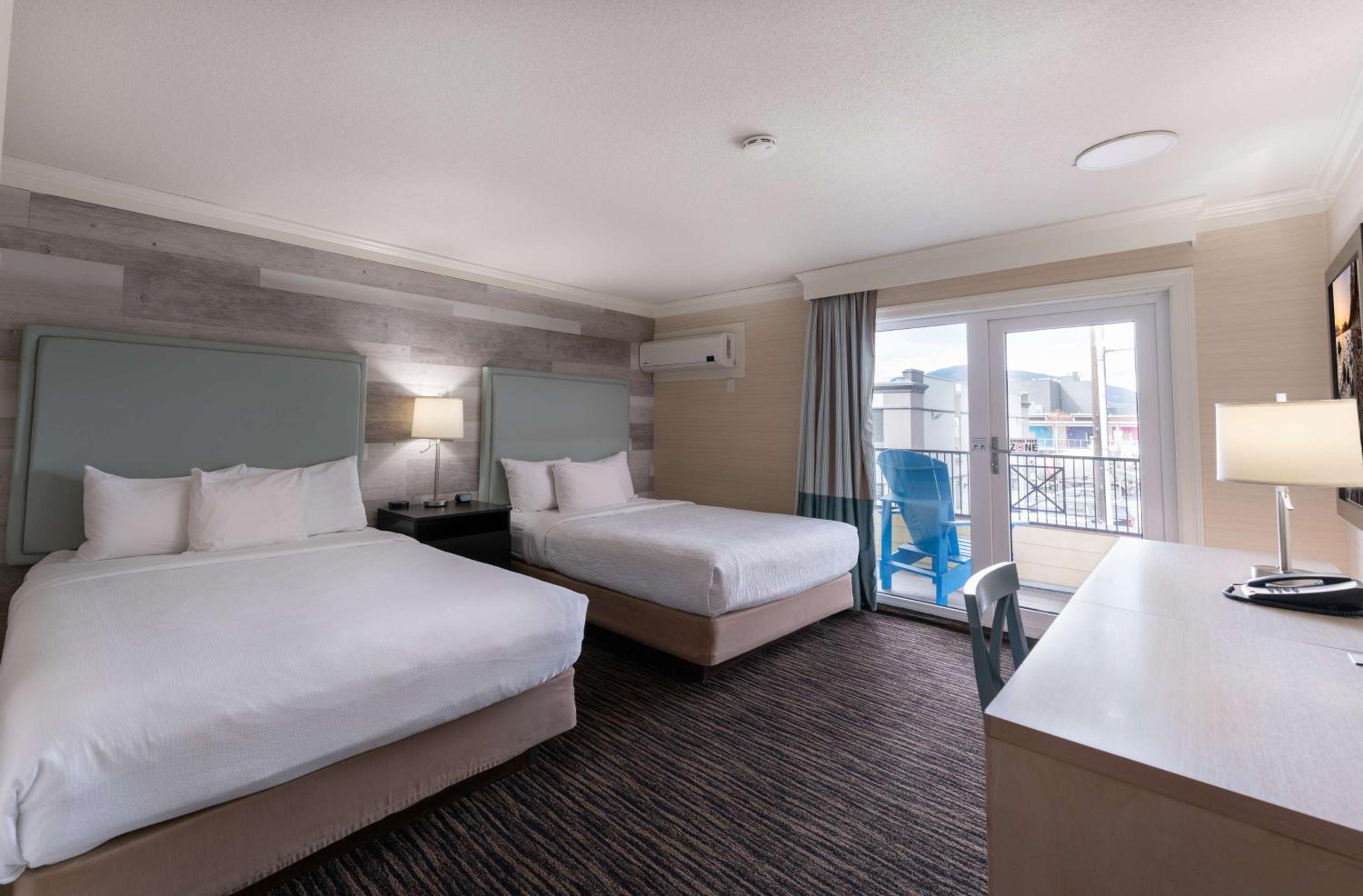 Queen Room with Two Queen Beds with Balcony - Photo 1