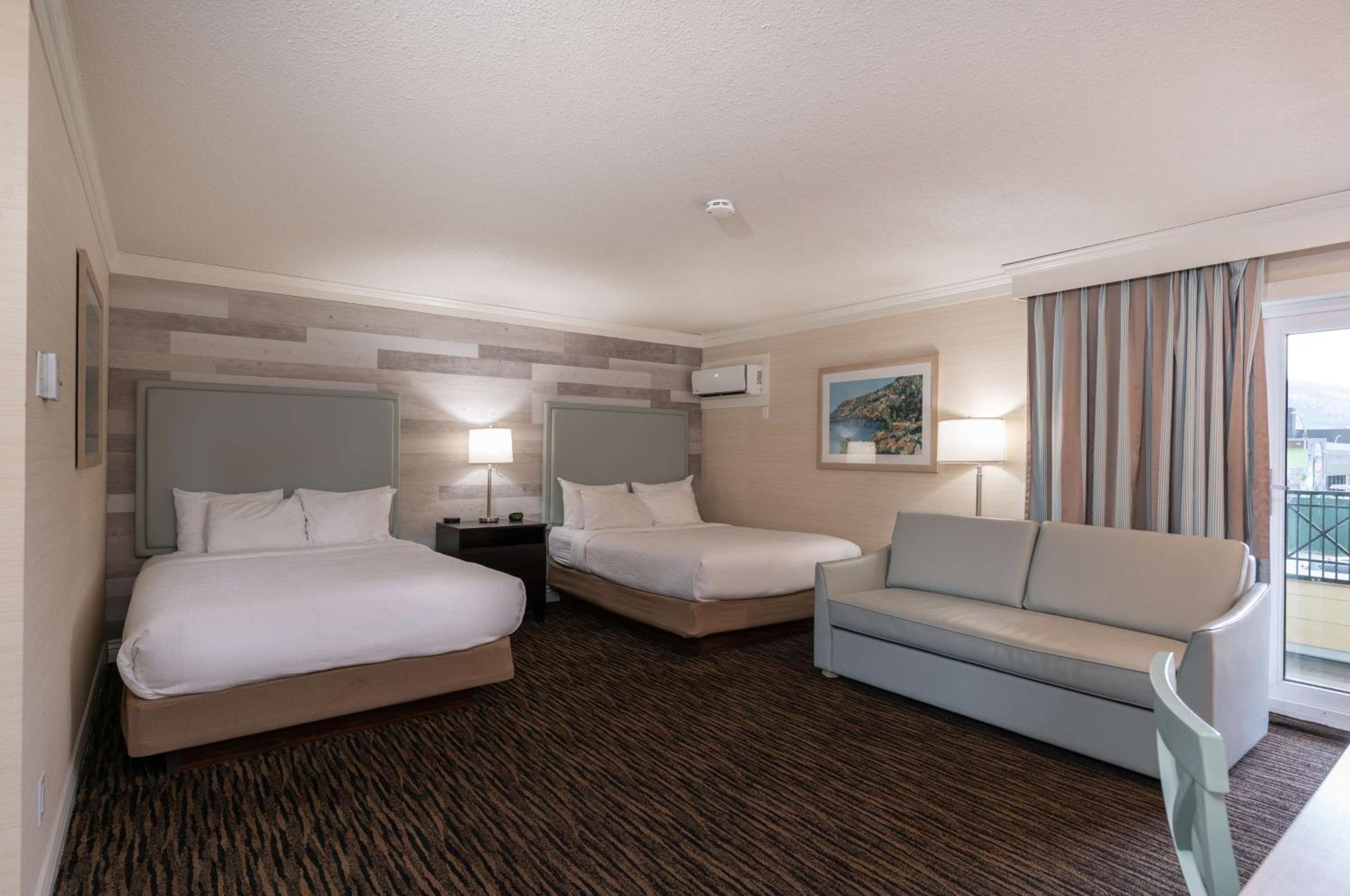 Queen Room with Two Queen Beds with Sofa Bed - Photo 1