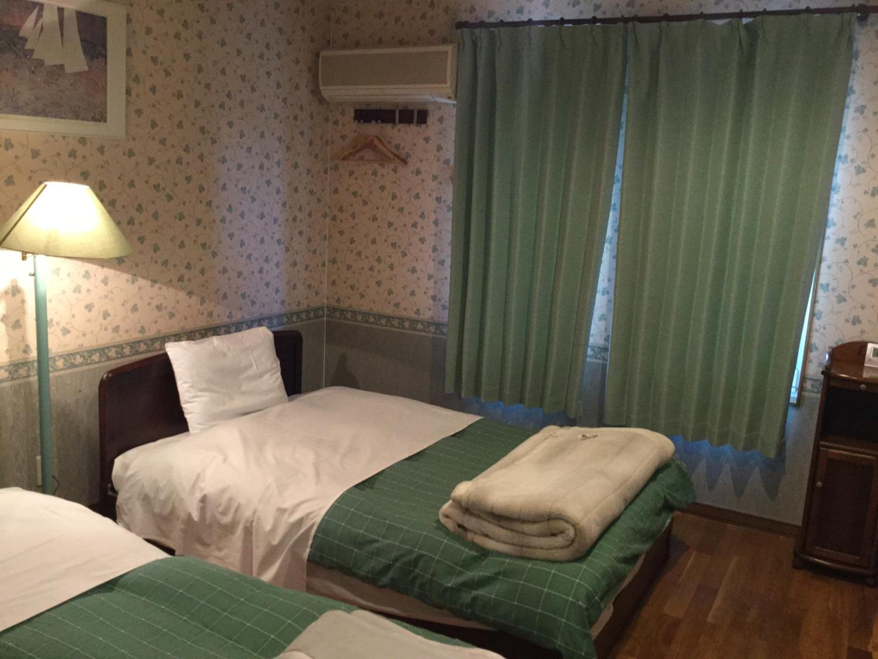 Triple Room with Private Bathroom - Non-Smoking photo 1