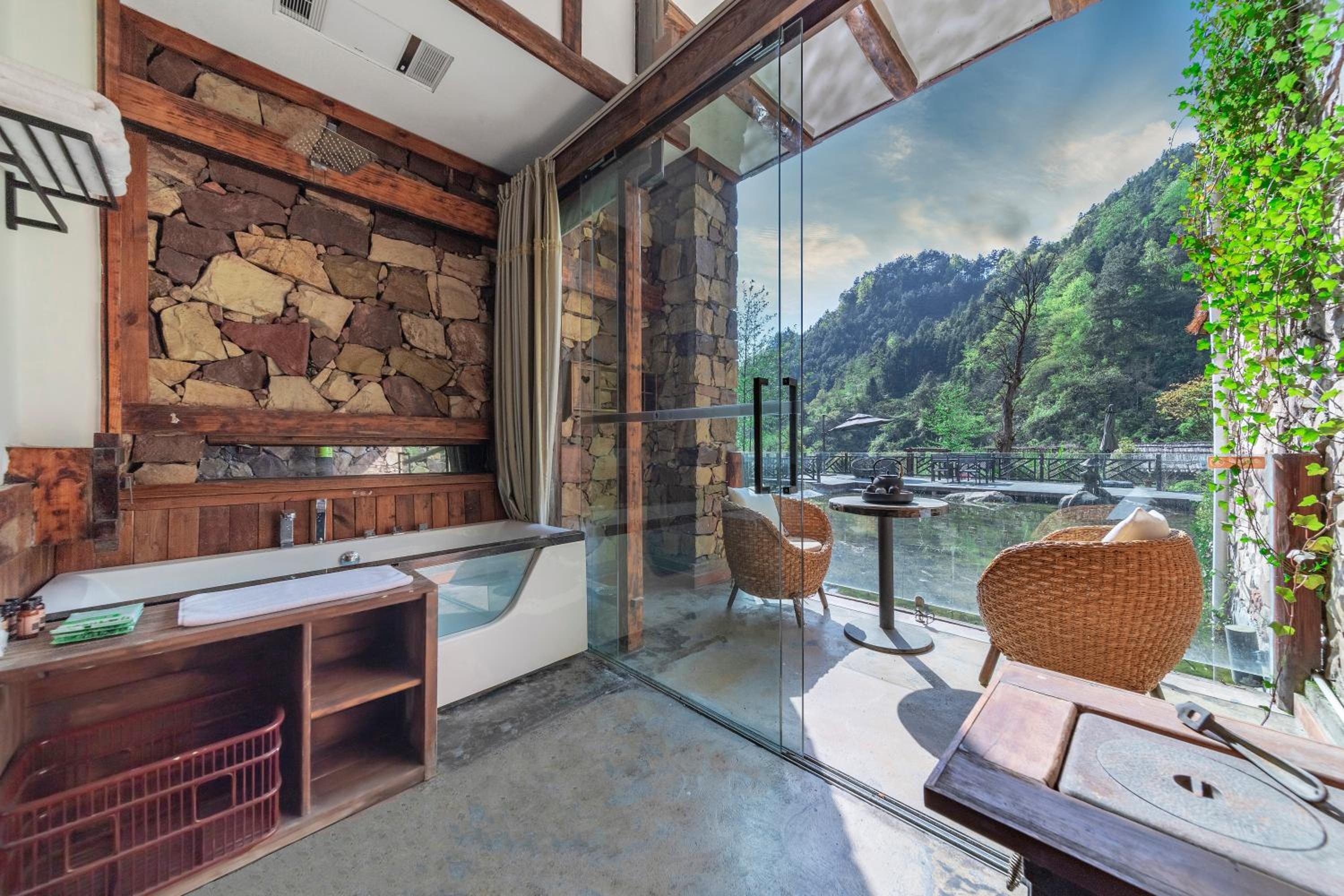 Queen room with Lotus Pond  View, Balcony, Bathtub, and Fireplace photo 2