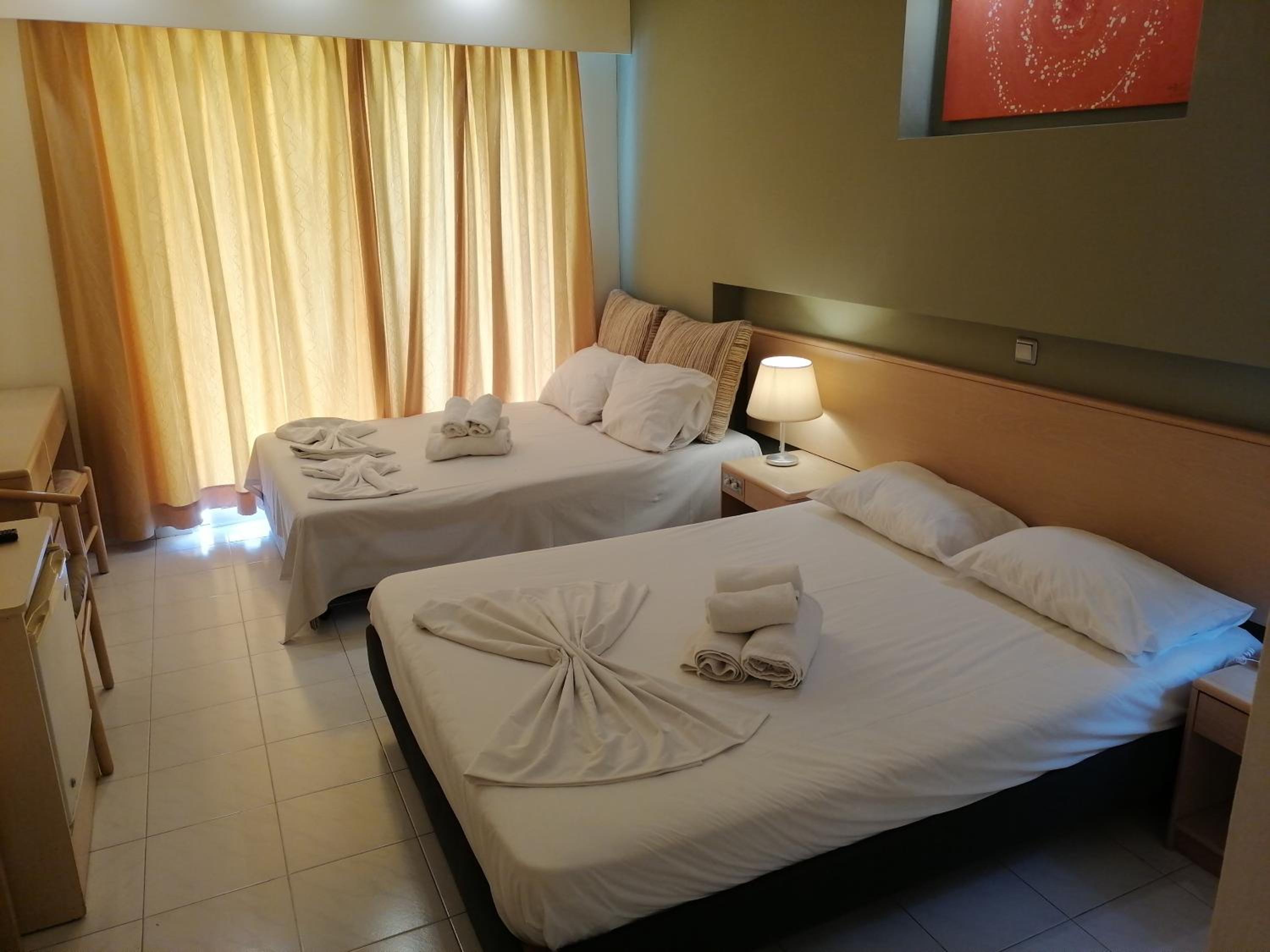 Quadruple Room (2 Adults + 2 Children)