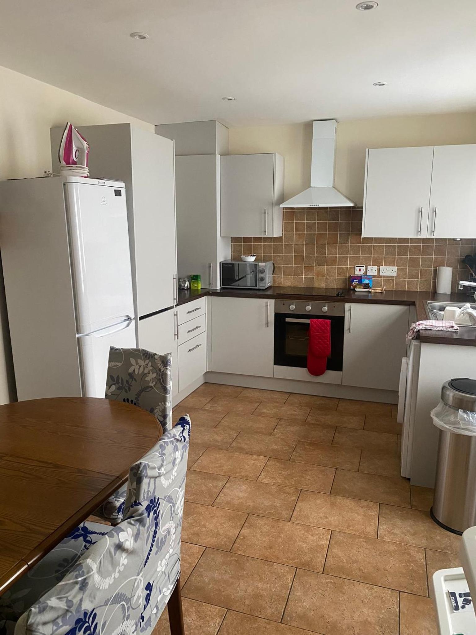 Three-Bedroom House - Photo 33