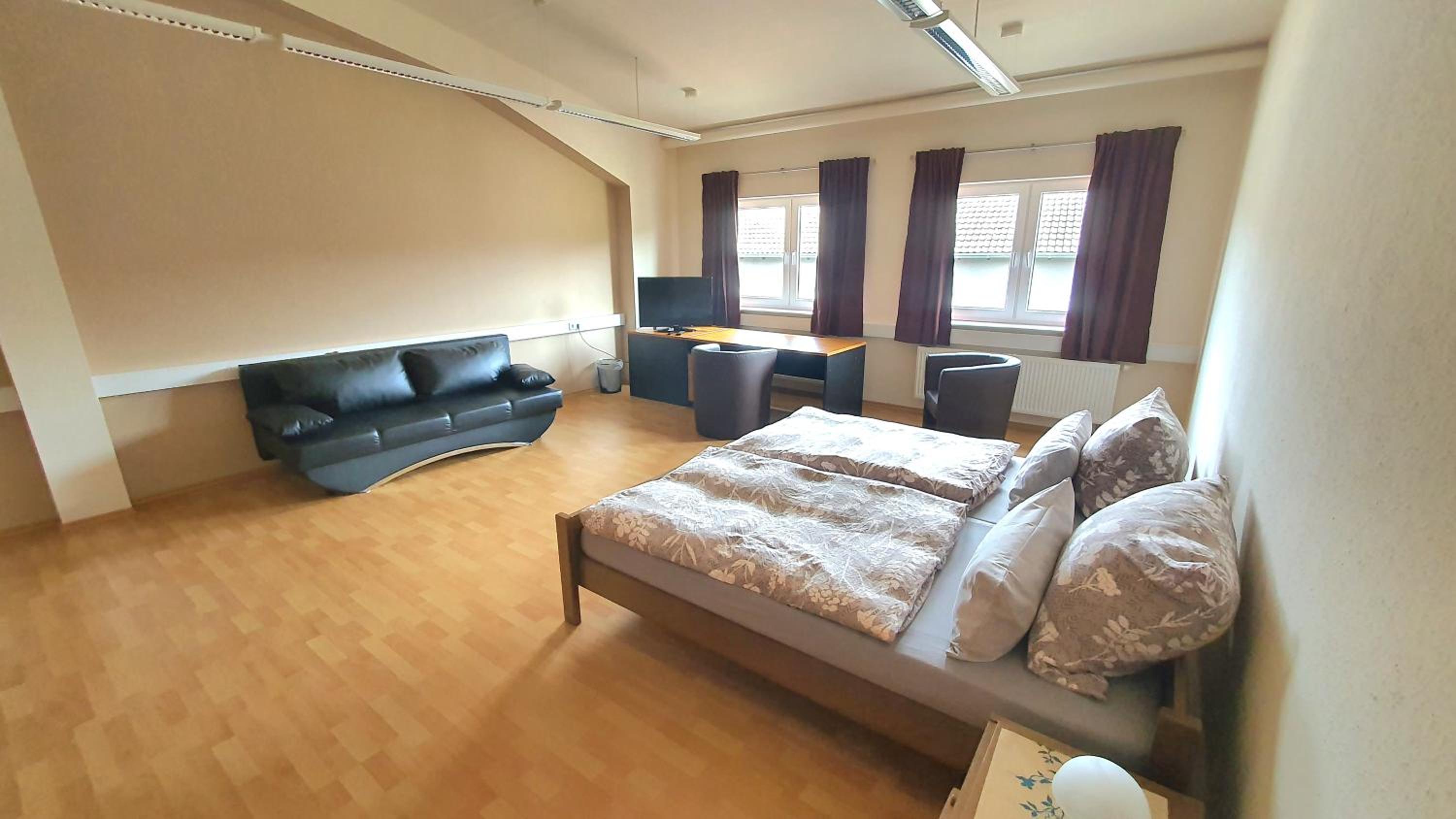 Three-Bedroom Apartment photo 1