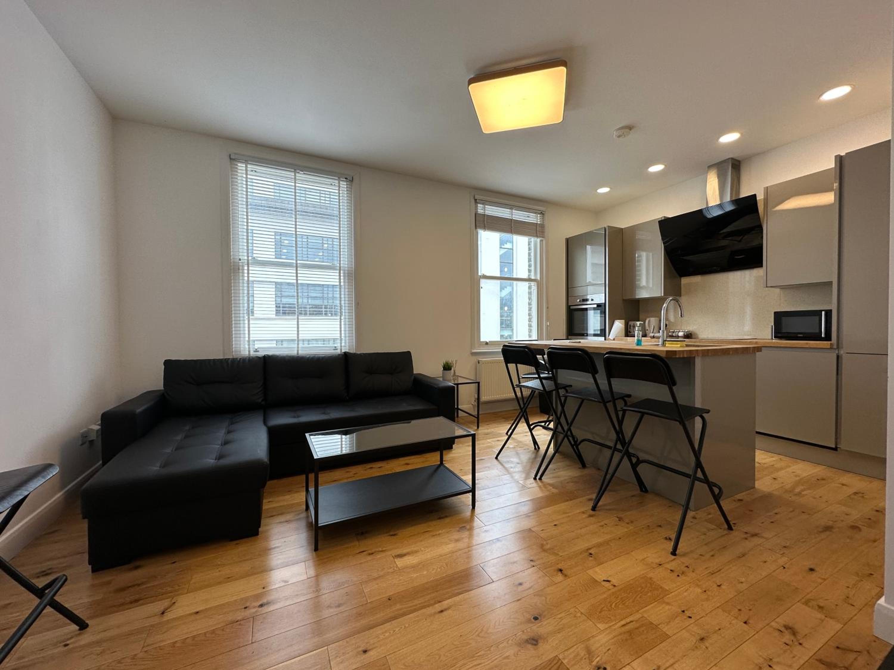 Three-Bedroom Apartment photo 1