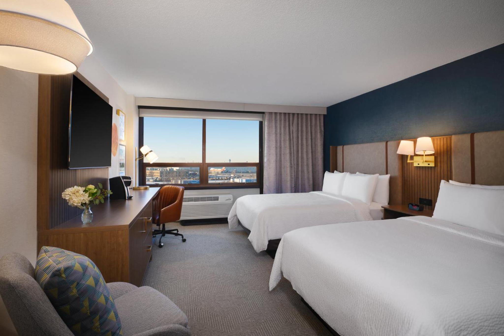 Premium Queen Room with Two Queen Beds and Airport View - Photo 2