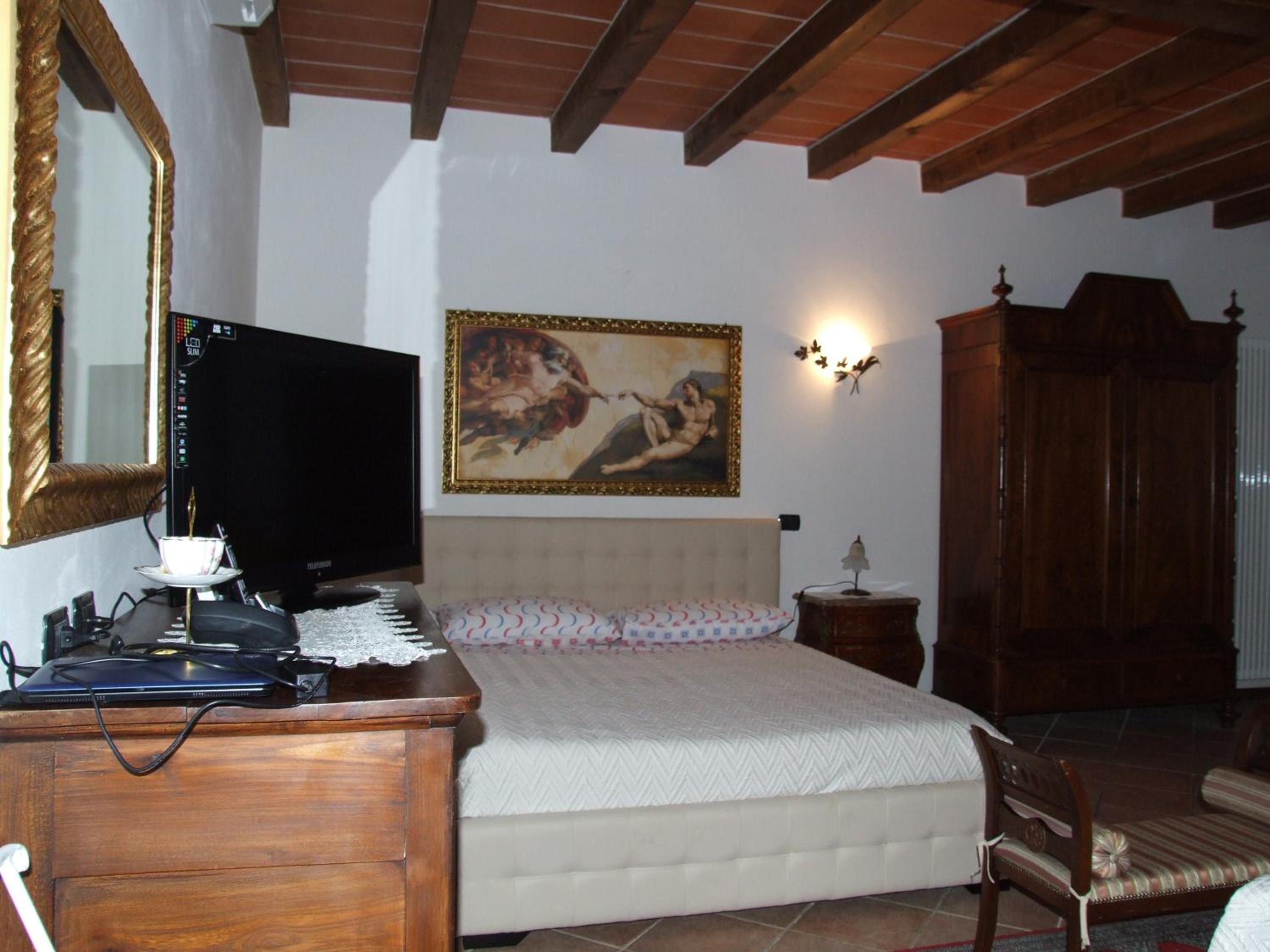 Deluxe Quadruple Room - Photo 2