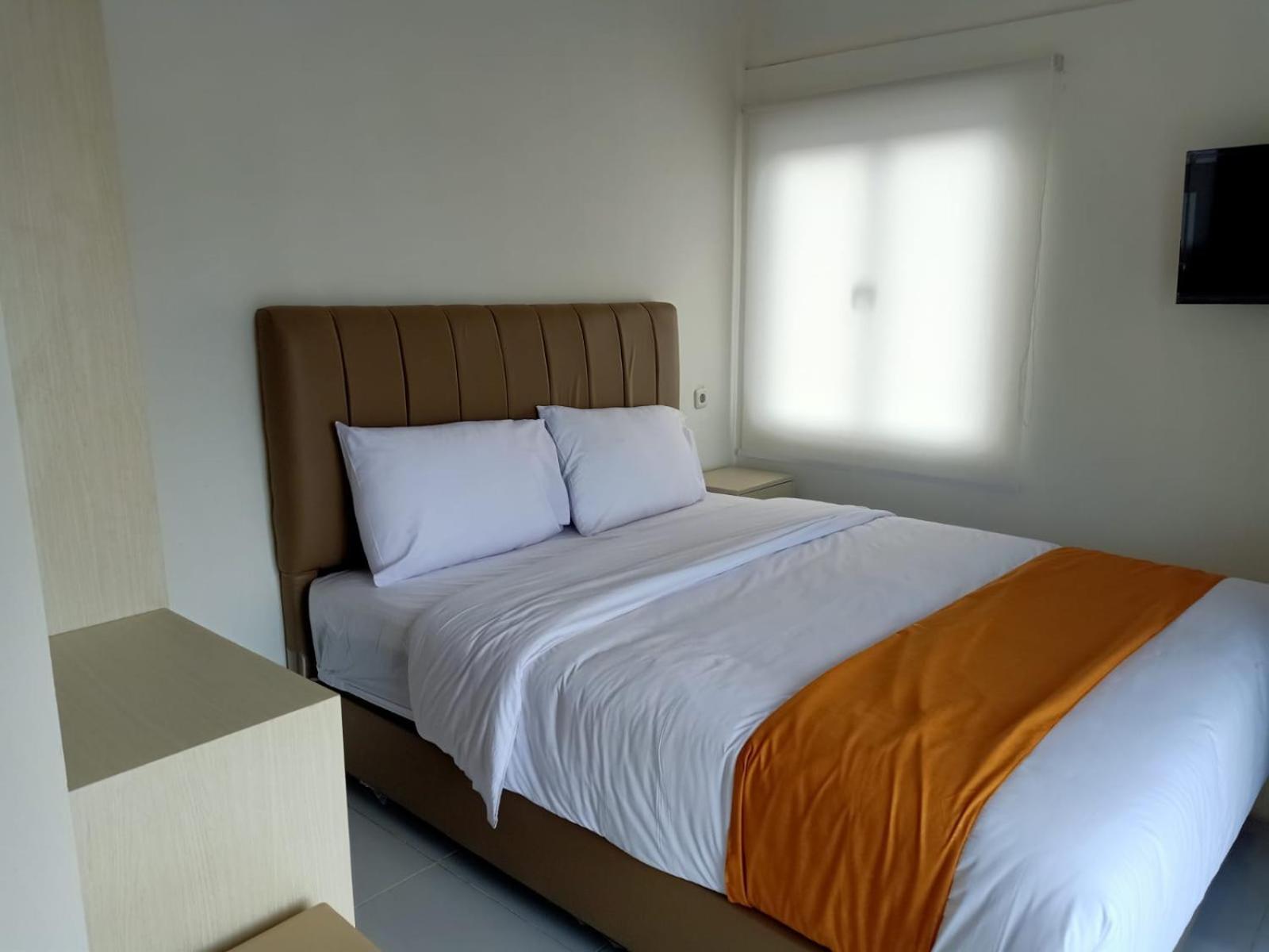 Deluxe Room - Photo 6