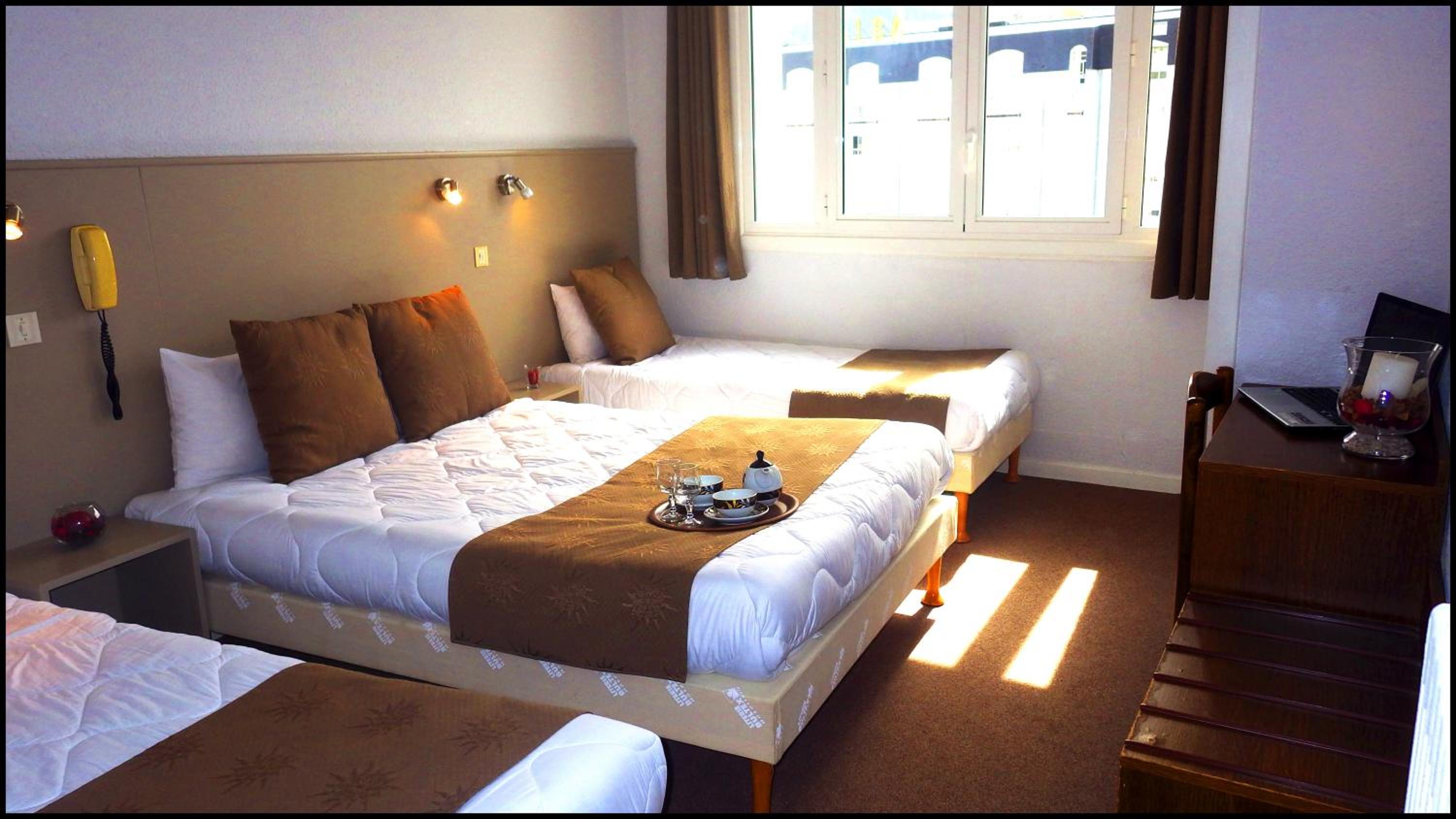 Quadruple Room (2 Adults + 2 Children) - Photo 1