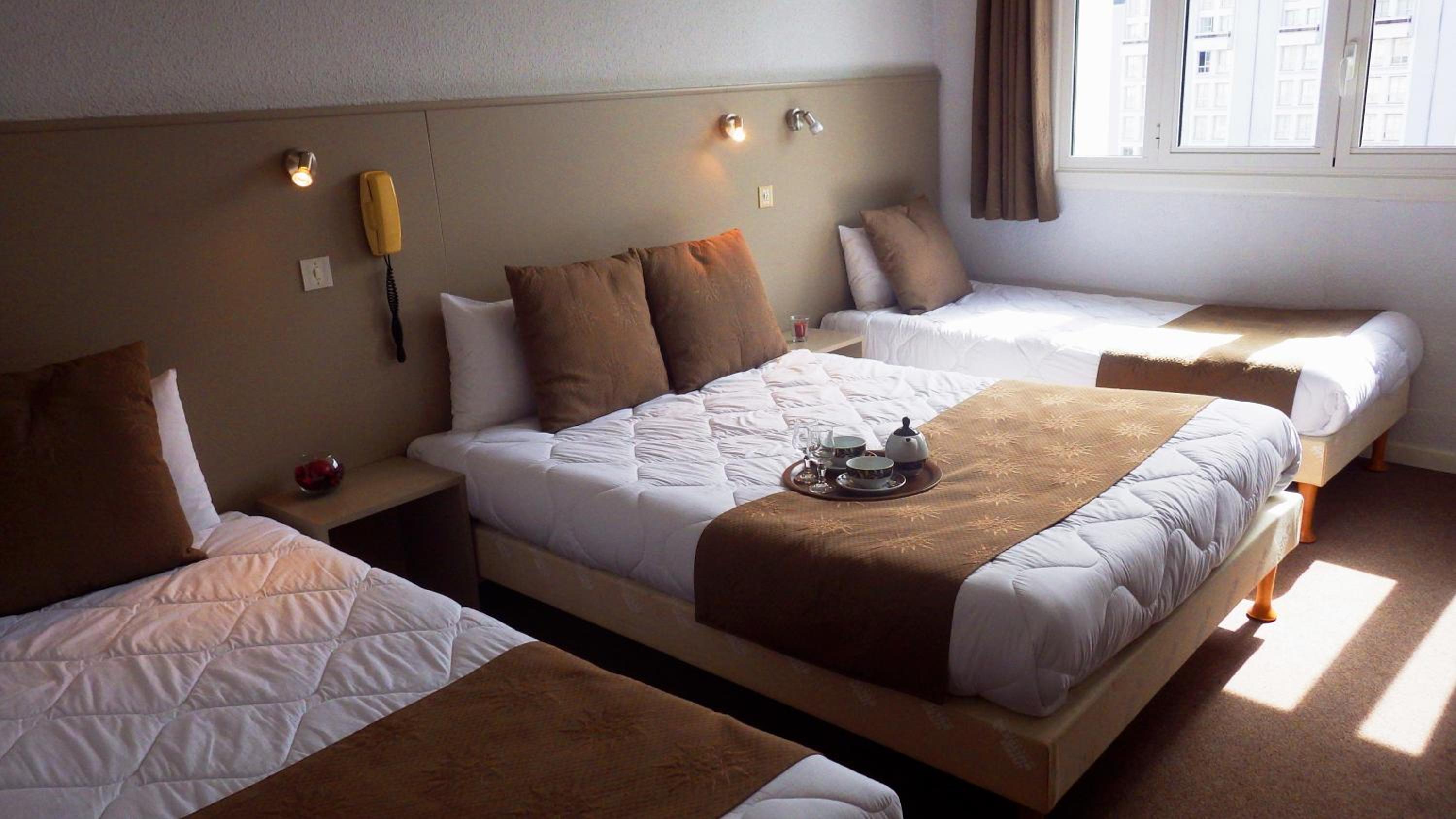 Quadruple Room (2 Adults + 2 Children) - Photo 7