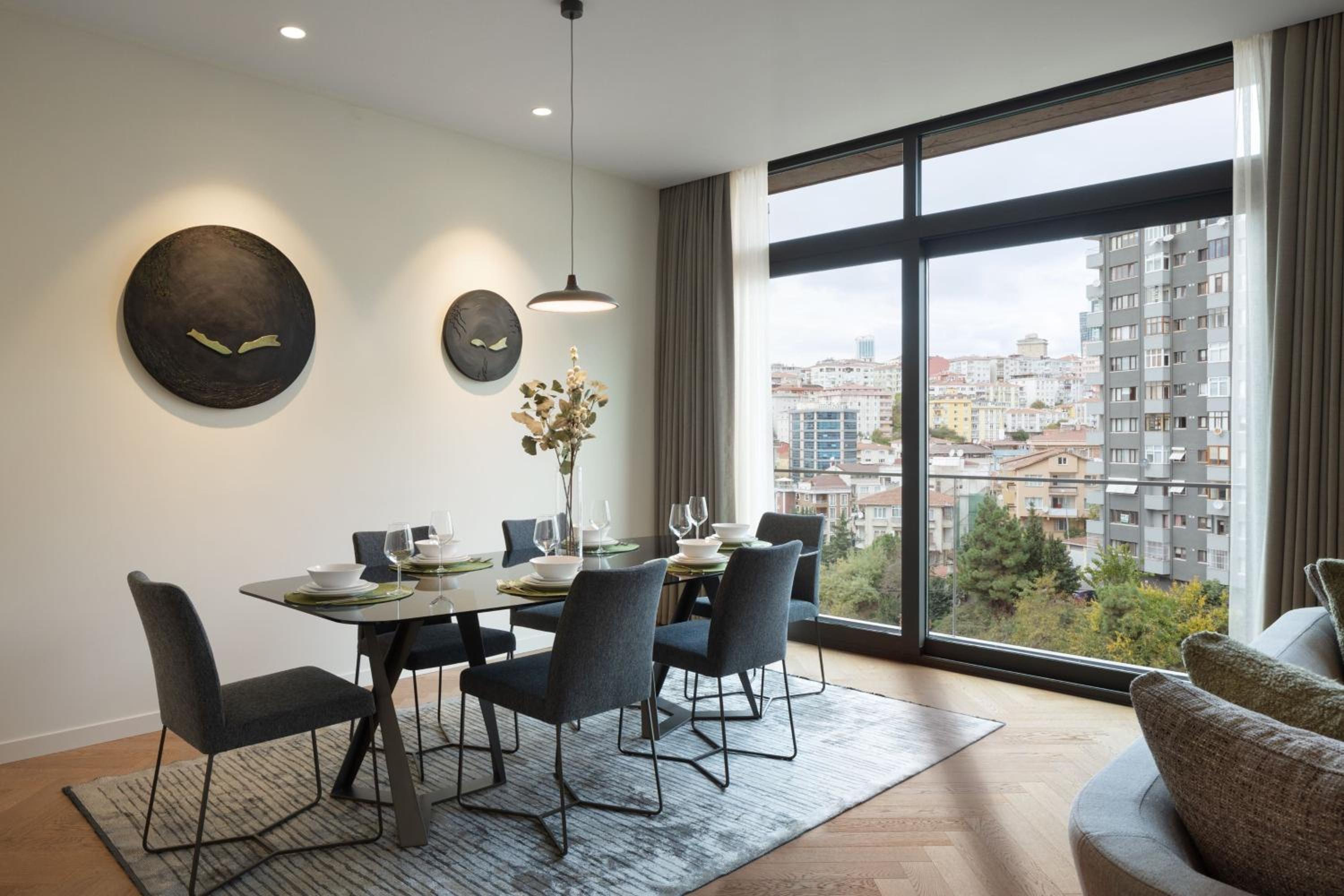 Three-Bedroom Apartment with Balcony and City View