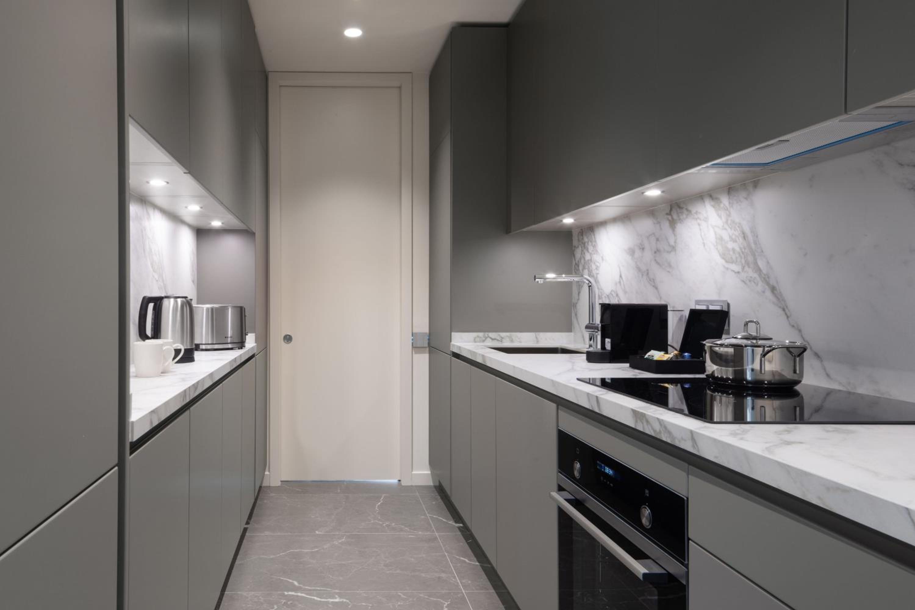 Three-Bedroom Apartment with Balcony and City View