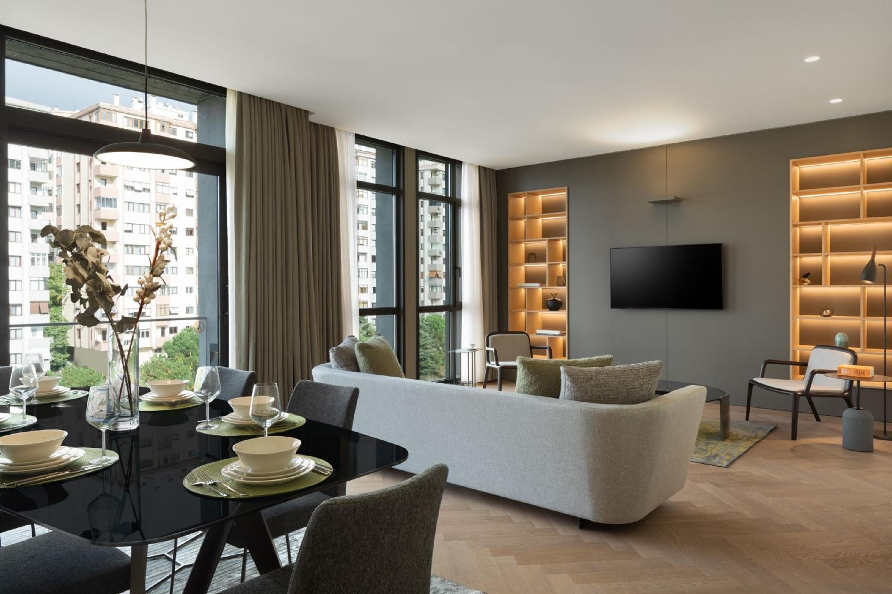 Three-Bedroom Apartment with Balcony and City View