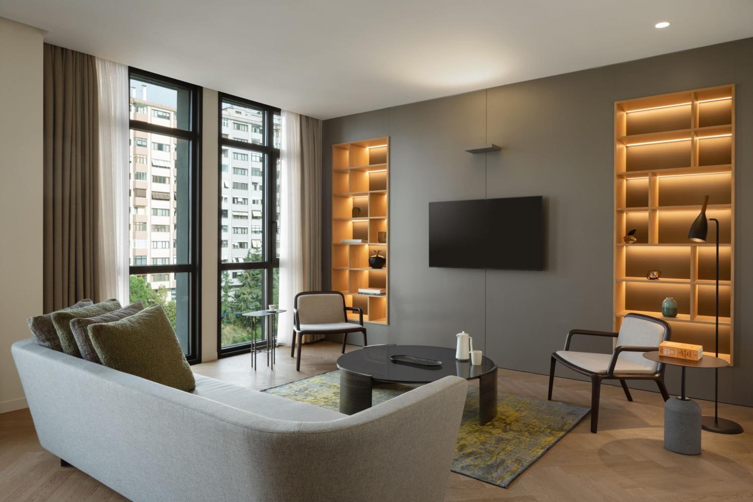 Three-Bedroom Apartment with Balcony and City View
