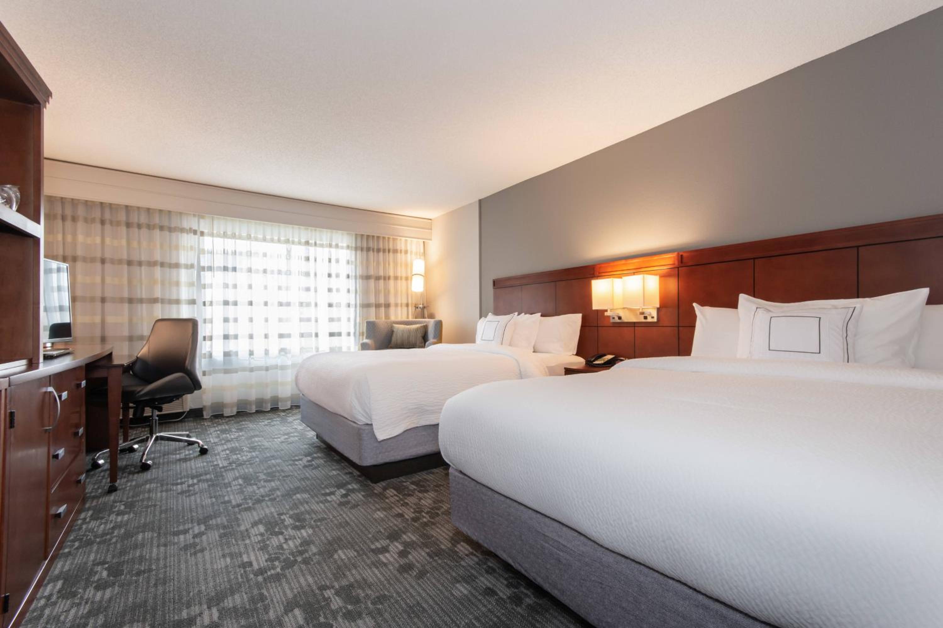 Queen Room with Two Queen Beds - Hearing Accessible photo 1