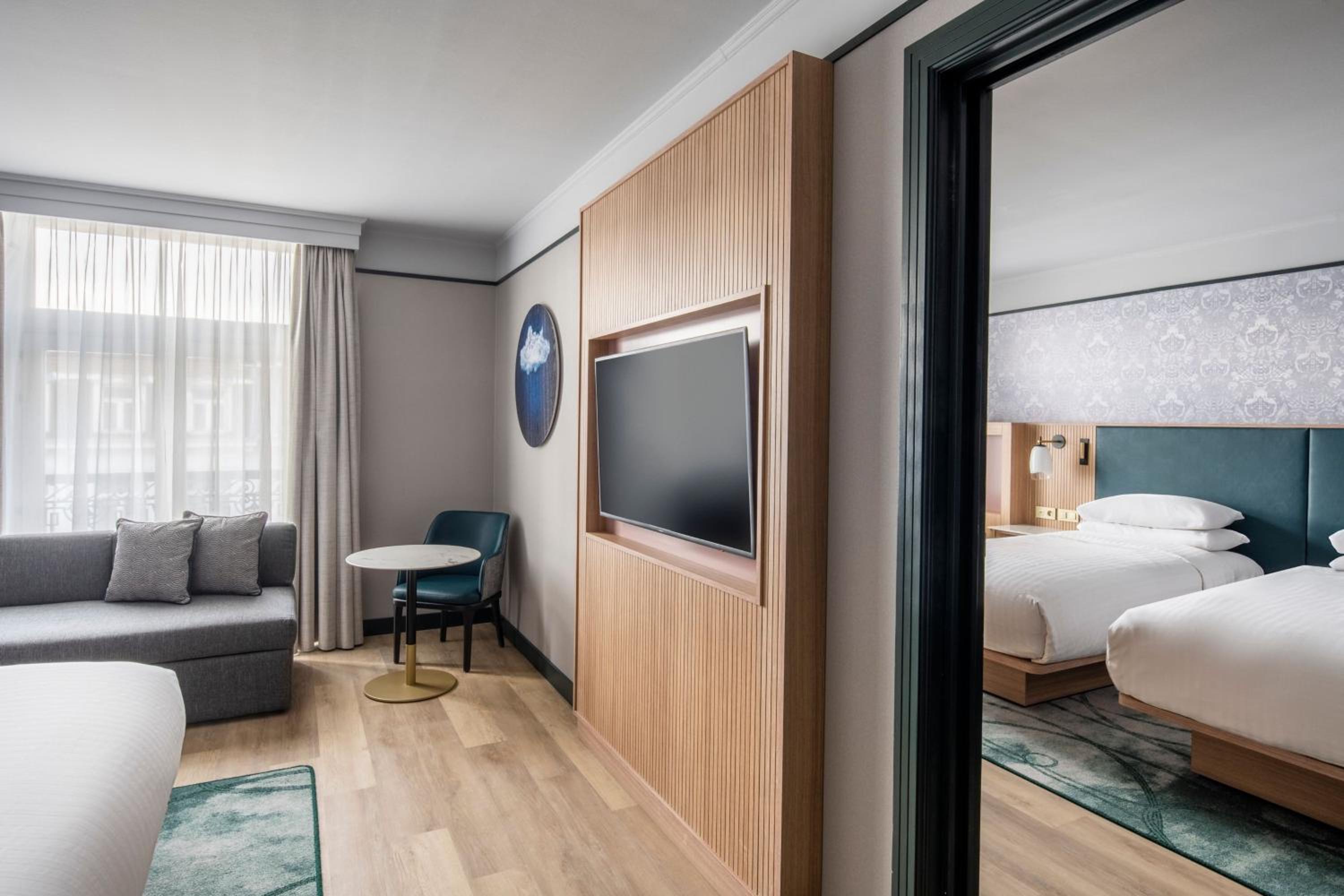 Two-Bedroom Connecting Room with One King and Two Twin Beds