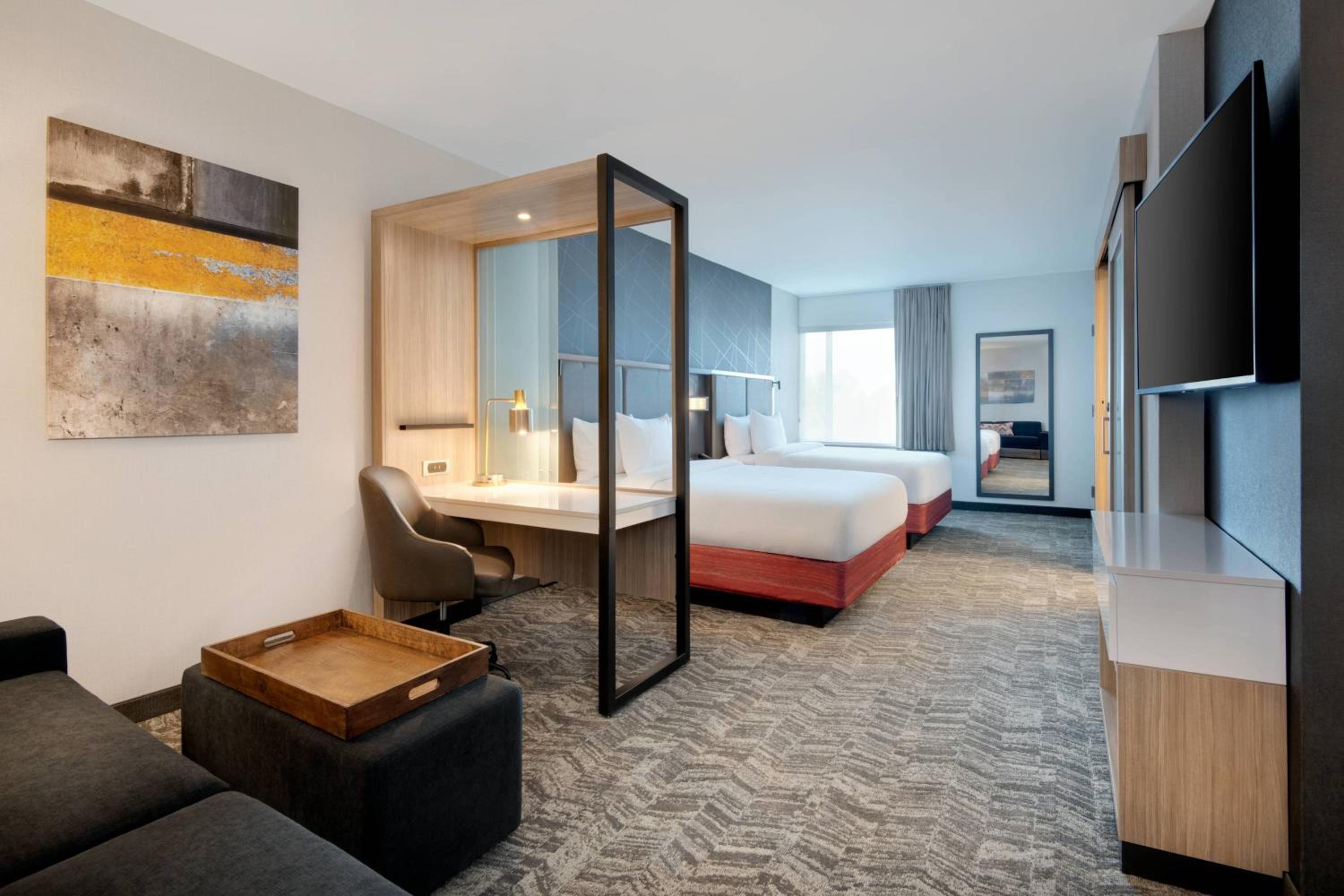 Queen Suite with Two Queen Beds and Sofa Bed - Photo 1
