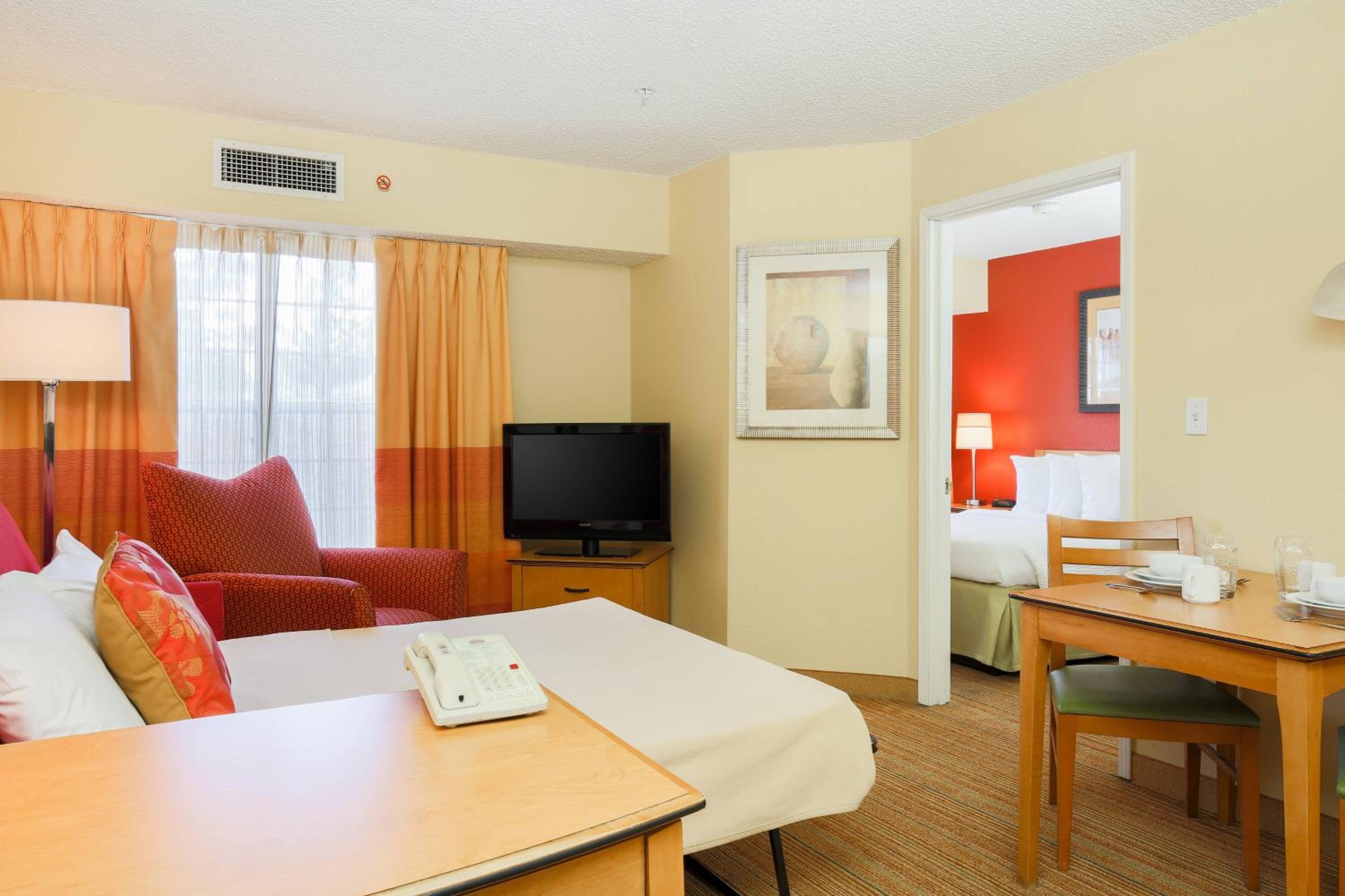 One-Bedroom Queen Suite with Sofa Bed - Photo 1
