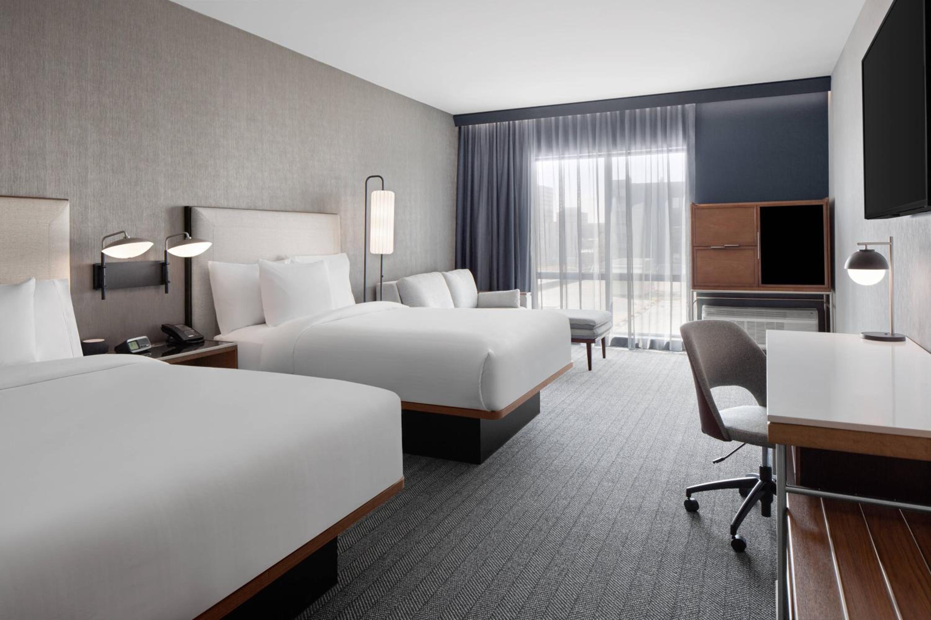 Queen Suite with 2 Queens and Sofa bed