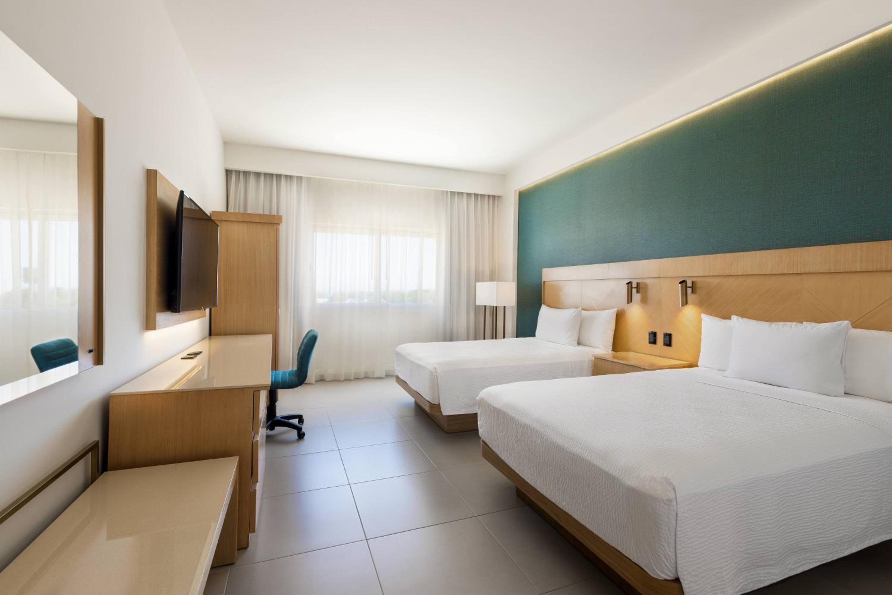 Standard Room with Two Double Beds and Airport Transfer photo 1