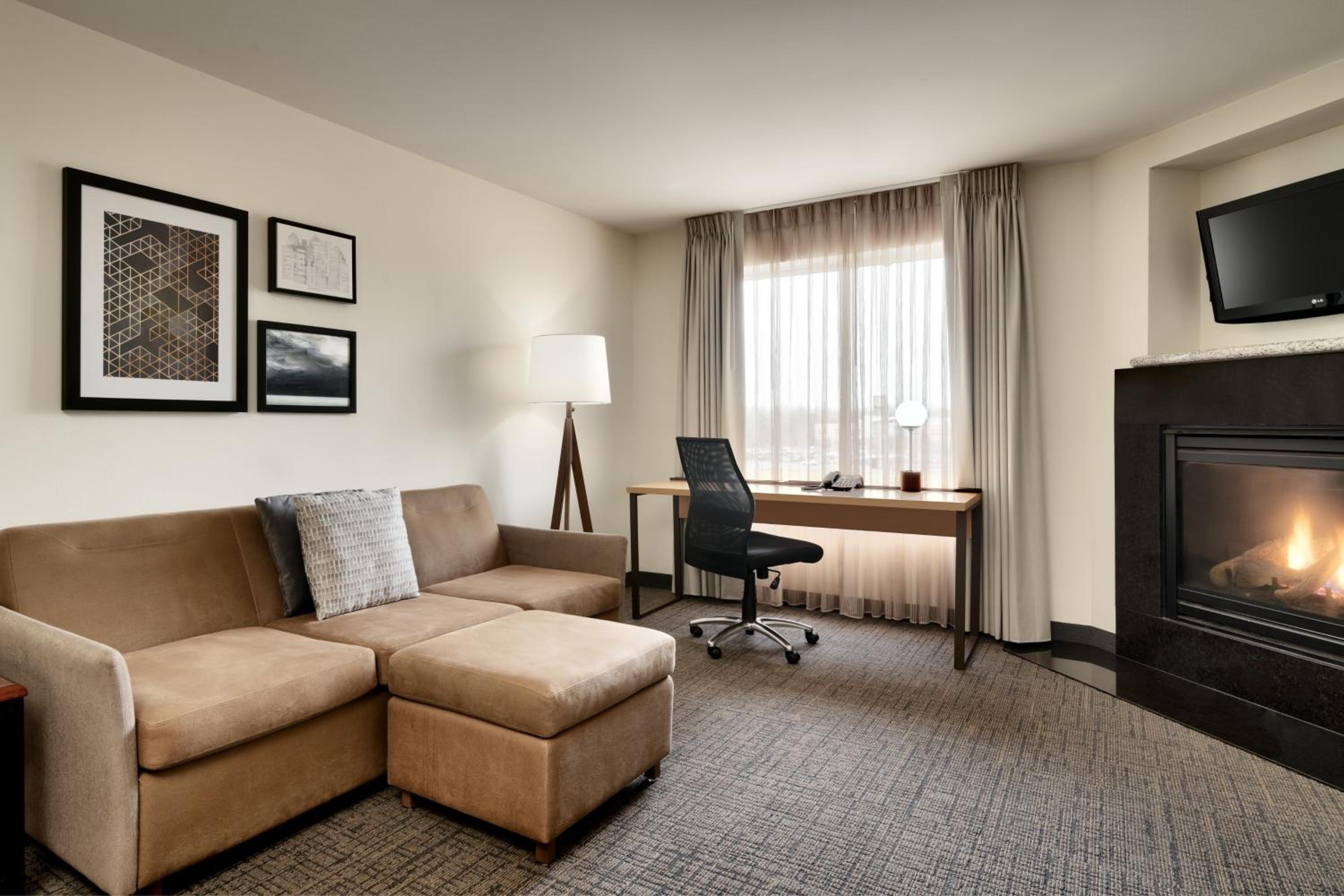 One-Bedroom King Suite with Sofa Bed and Adapted Tub - Mobility Accessible photo 1
