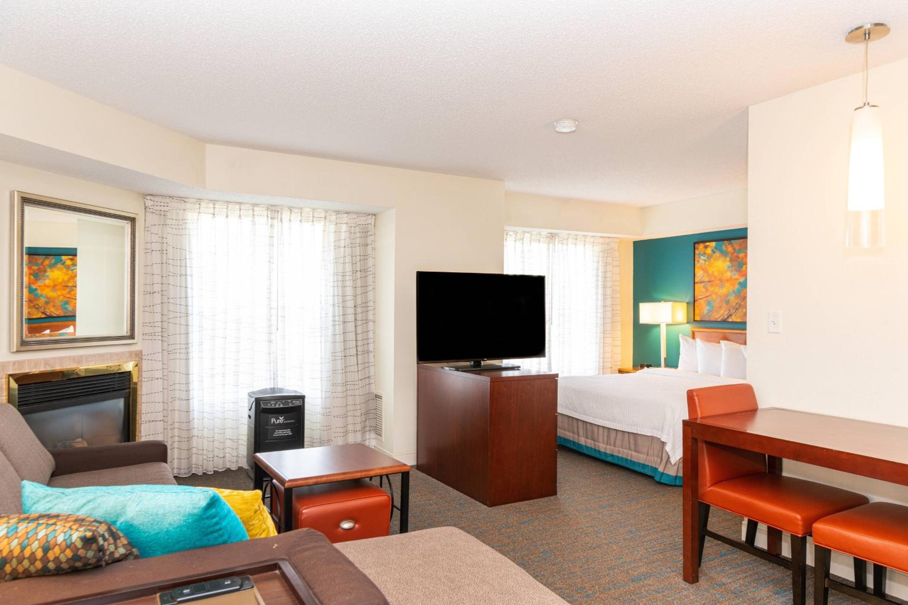 Pure Wellness Queen Studio Suite with Sofa Bed - Photo 1