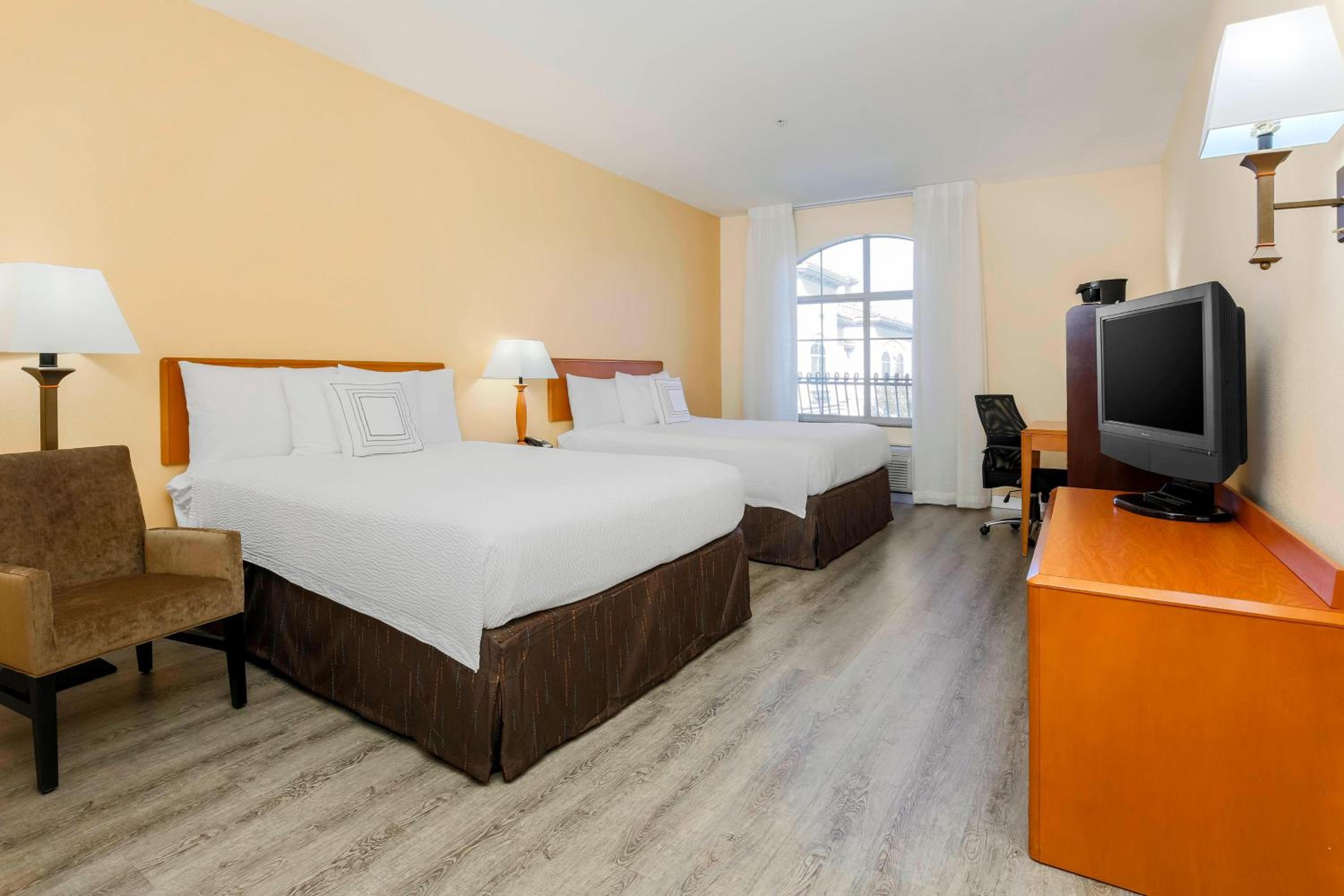 Queen Room with Two Queen Beds - Photo 1