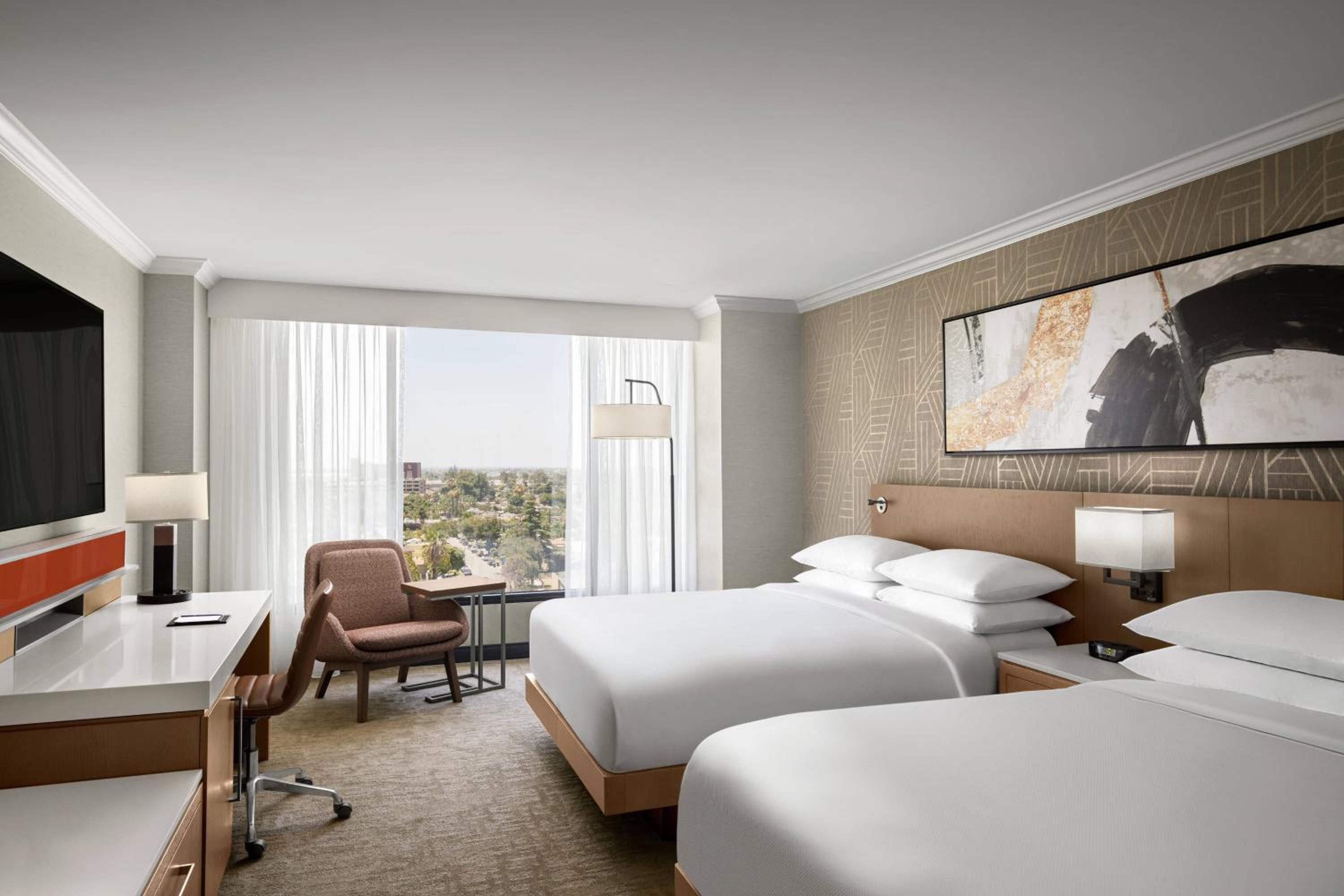Queen Room with Two Queen Beds - Photo 1