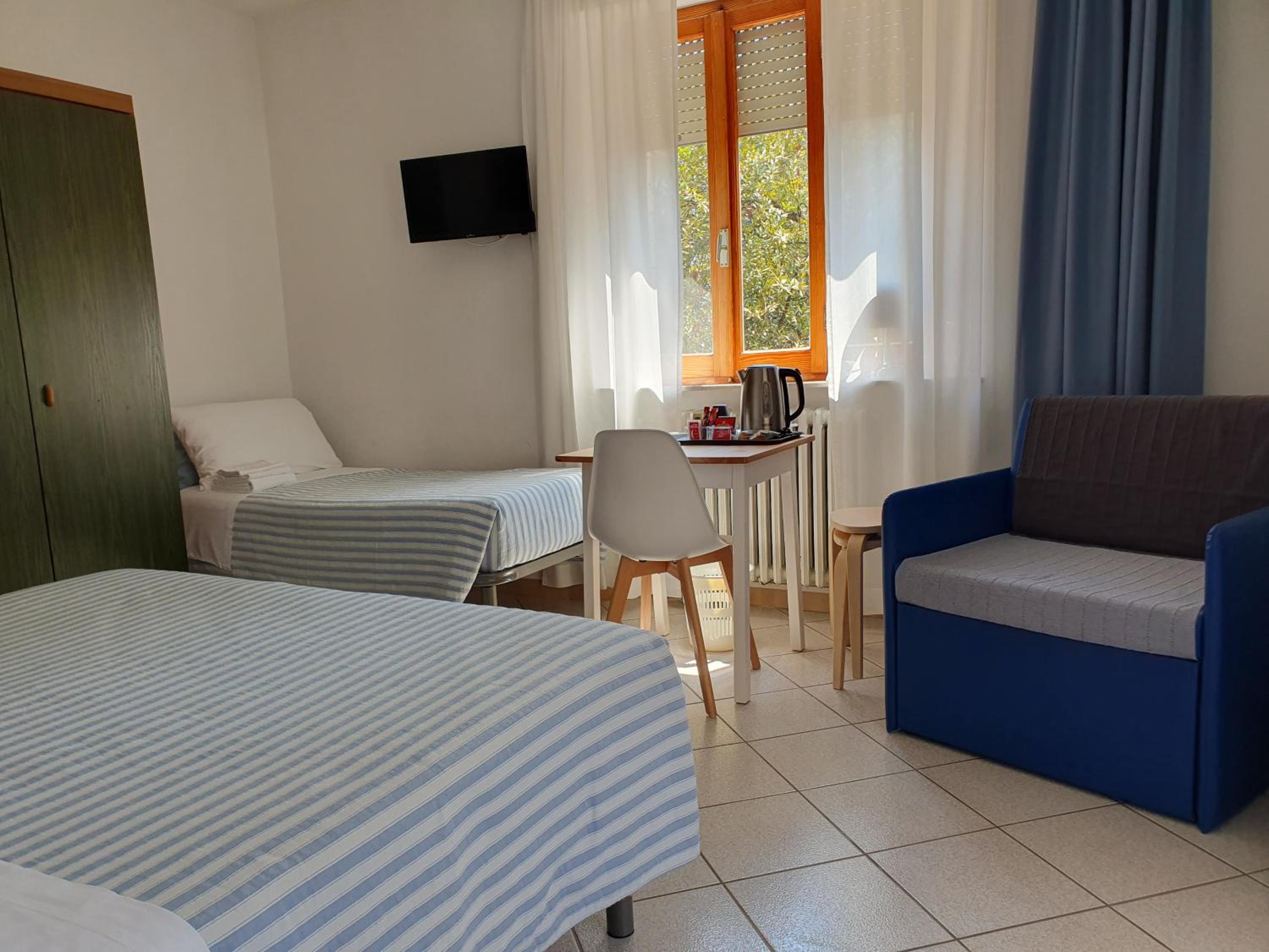 Quadruple Room with Balcony photo 2