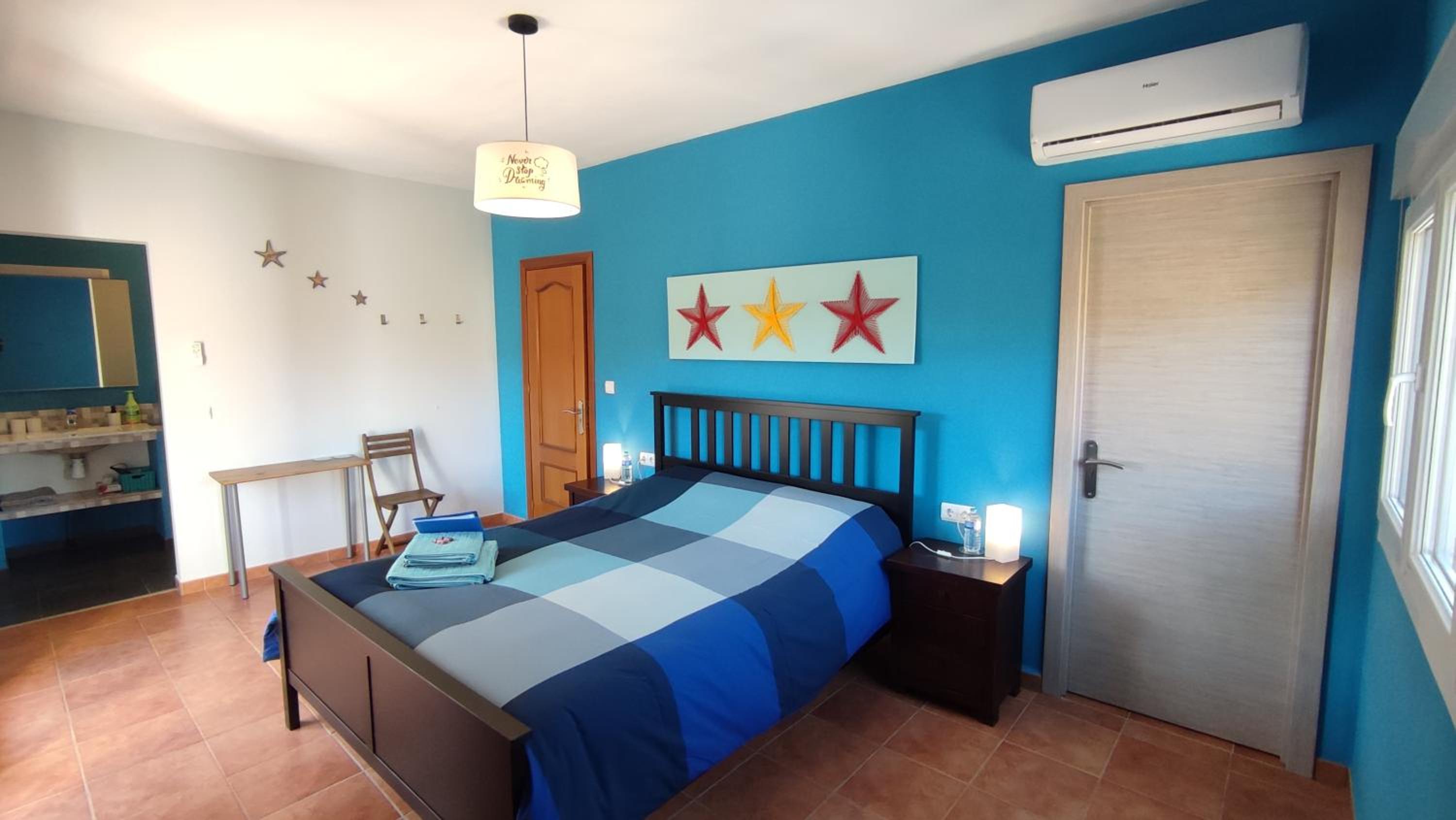 Habitación Triple con Balcón